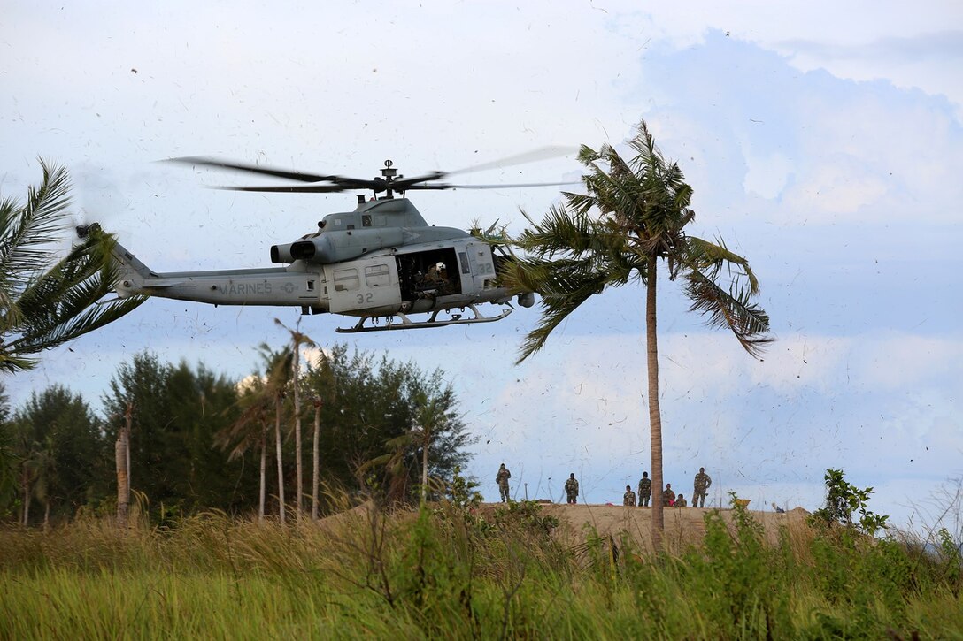 An AH-1Z  Super  Cobra with Marine Medium Tiltrotor Squadron 163 (Reinforced), 11th Marine Expeditionary Unit, performs “touch-and-go” drills during Malaysia-United States Amphibious Exercise 2014 Aug. 31. MALUS AMPHEX 14 is a bilateral exercise between the 11th MEU and Malaysian Armed Forces designed to foster and sustain cooperative and international relationships with emphasis on amphibious and humanitarian operations within the context of a stability and security operation. (U.S. Marine Corps photo by Sgt. Melissa Wenger/Released)