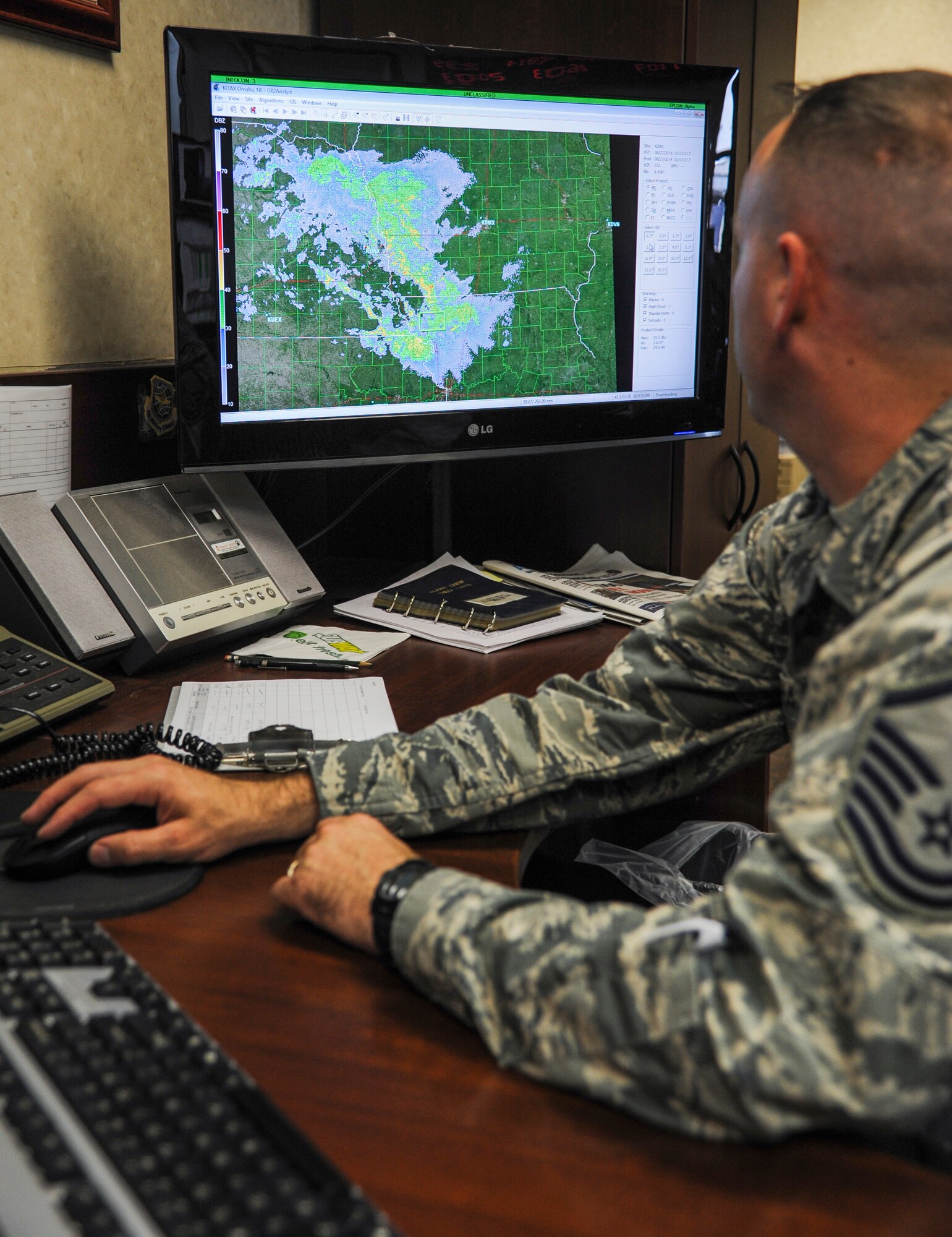 Master Sgt. Benjamin Tusha, 19th Operations Support Squadron weather flight noncommissioned officer in charge, looks at base reflectivity by using Doppler weather radar Aug. 27, 2014, at Little Rock Air Force Base, Ark. The 19th OSS weather flight routinely observes weather patterns across Arkansas including Little Rock AFB, two drop zones and a landing zone. (U.S. Air Force photo by Airman 1st Class Harry Brexel)