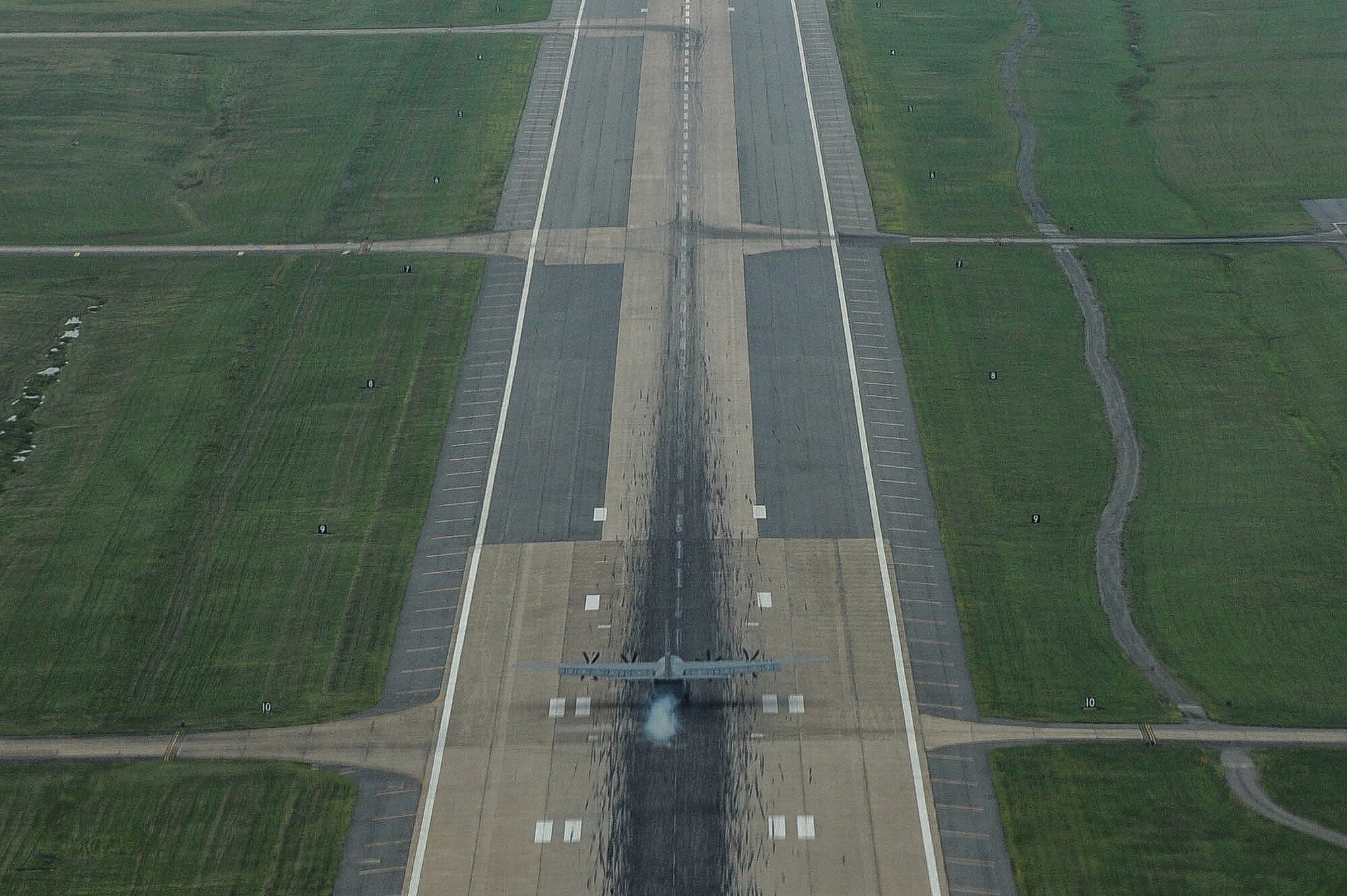 A 41st Airlift Squadron C-130J lands after completing a sortie Aug. 7 2014, at Little Rock Air Force Base, Ark. The aircraft is capable of operating from rough, dirt strips and fulfills a wide range of operational missions. (U.S. Air Force photo by Airman 1st Class Cliffton Dolezal)