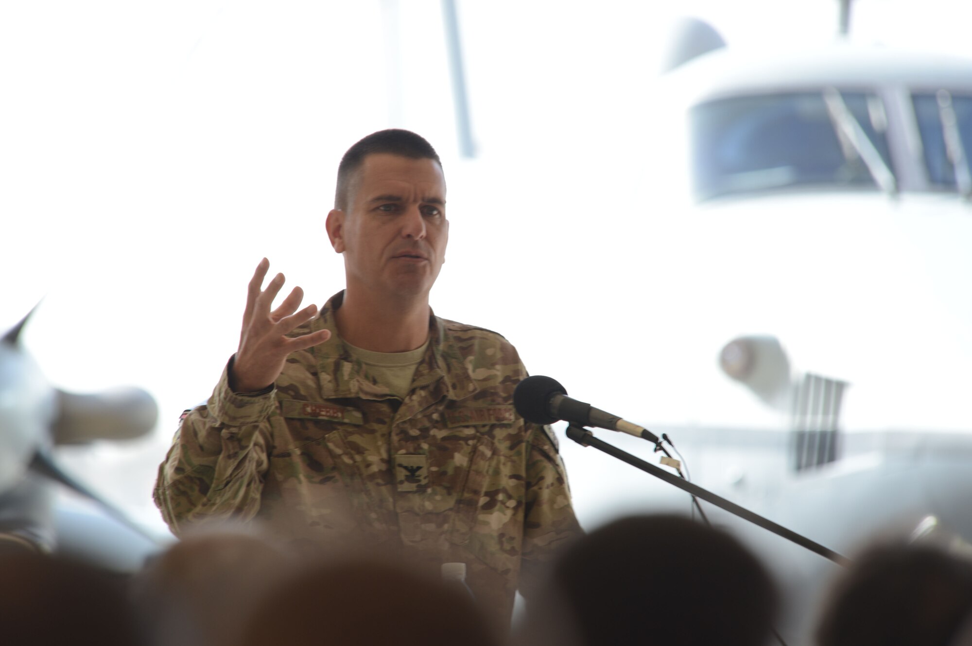 U.S. Air Force Col. Rhude Cherry III, 451st Air Expeditionary Group commander makes a few remarks about the success of the 361st Expeditionary Reconnaissance Squadron to attendees of the 361 ERS deactivation ceremony Sept. 1, 2014 at Kandahar Airfield, Afghanistan. Activated on May 1, 2010, the 361 ERS utilized the MC-12W to fulfill their intelligence, surveillance and reconnaissance. (U.S. Air Force photo by Master Sgt. Cohen A. Young/Released)