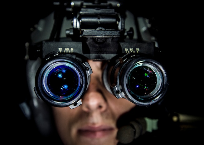 Airman 1st Class Bradley Jones, 437th Operations Support Squadron aircrew flight equipment technician, inspects a pair of night vision goggles used by C-17A Globemaster III aircrew members Sep. 3, 2014, at Joint Base Charleston, S.C. Jones checks the NVG’s for any damaged parts and ensures they work properly. (U.S. Air Force photo/Senior Airman Dennis Sloan)
