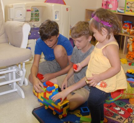 Maria Camacho is one of four Family Childcare Program providers who care for children in their homes. The FCC is now in the recruitment process and anyone who lives on base or in Huntington Village can apply to be a  provider. (U.S. Air Force photo by Misuzu Allen)