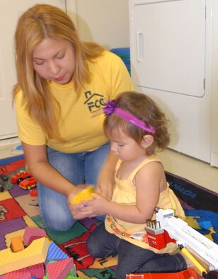Maria Camacho is one of four Family Childcare Program providers who care for children in their homes. The FCC is now in the recruitment process and anyone who lives on base or in Huntington Village can apply to be a  provider. (U.S. Air Force photo by Misuzu Allen)
