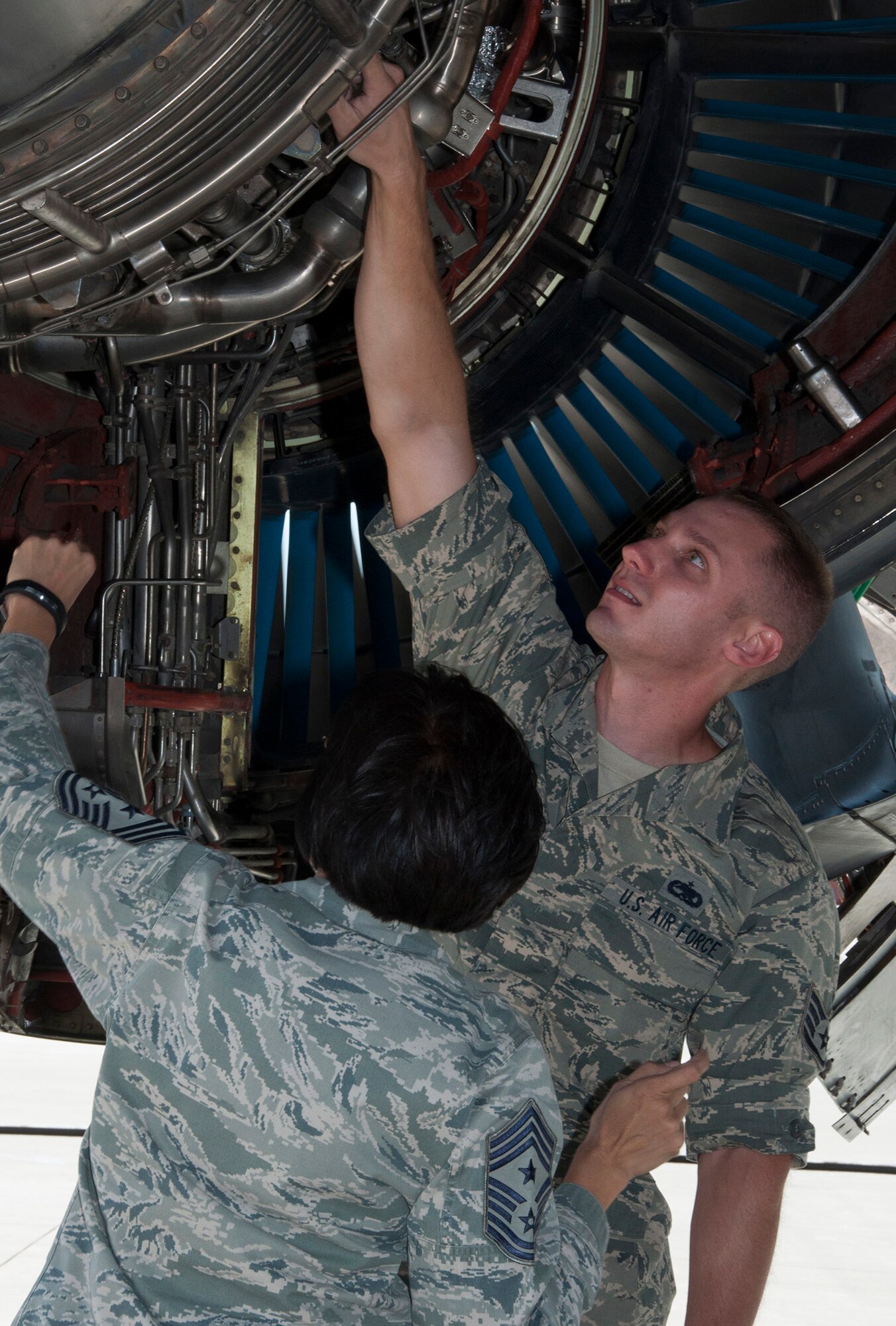TRAVIS AIR FORCE BASE, Calif. -- Chief Master Sgt. Ericka E. Kelly, 349th Air Mobility Wing, command chief, had the opportunity to job shadow Staff Sgt. Scott Henrich, aerospace propulsion craftsman, 749th Aircraft Maintenance Squadron, August 24, 2014. (U.S. Air Force photo/Staff Sgt. Cindy G. Alejandrez) 
