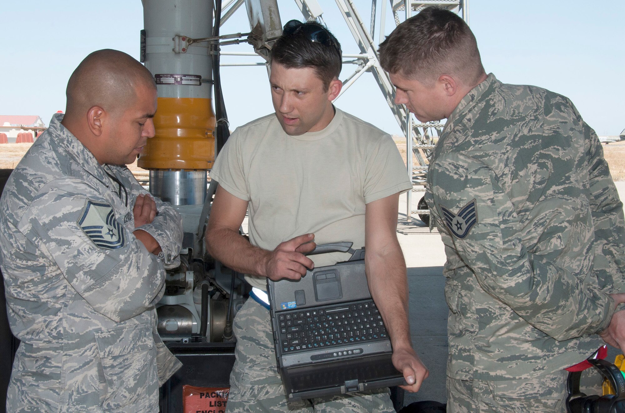 TRAVIS AIR FORCE BASE, Calif. -- Chief Master Sgt. Ericka E. Kelly, 349th Air Mobility Wing, command chief, had the opportunity to job shadow Staff Sgt. Scott Henrich, aerospace propulsion craftsman, 749th Aircraft Maintenance Squadron, August 24, 2014. (U.S. Air Force photo/Staff Sgt. Cindy G. Alejandrez) 
