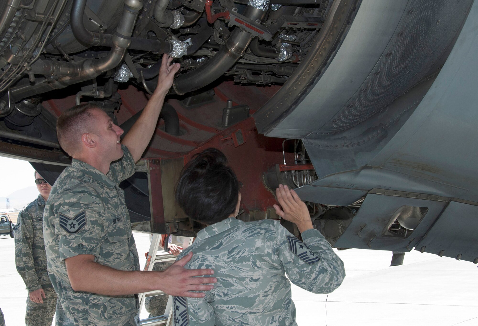 TRAVIS AIR FORCE BASE, Calif. -- Chief Master Sgt. Ericka E. Kelly, 349th Air Mobility Wing, command chief, had the opportunity to job shadow Staff Sgt. Scott Henrich, aerospace propulsion craftsman, 749th Aircraft Maintenance Squadron, August 24, 2014. (U.S. Air Force photo/Staff Sgt. Cindy G. Alejandrez) 
