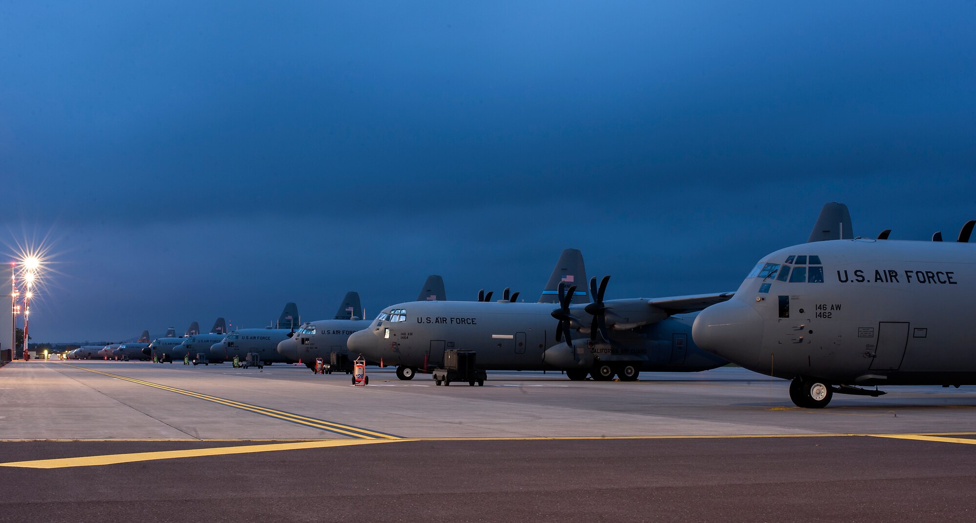 Aircraft with the Air National Guard and the 37th Airlift Squadron sit on the flightline in support of Steadfast Javilen II at Ramstein Air Base, Germany, Sept. 2, 2014. The U.S. Air Force and Air National Guard support Steadfast Javelin II by providing personnel air drop and air landings in support of forcible entry and force projection, reinforcing the joint commitment to Operation Atlantic Resolve, and a  demonstrated commitment to our NATO allies and security in Eastern Europe. (U.S. Air Force photo/Senior Airman Damon Kasberg)