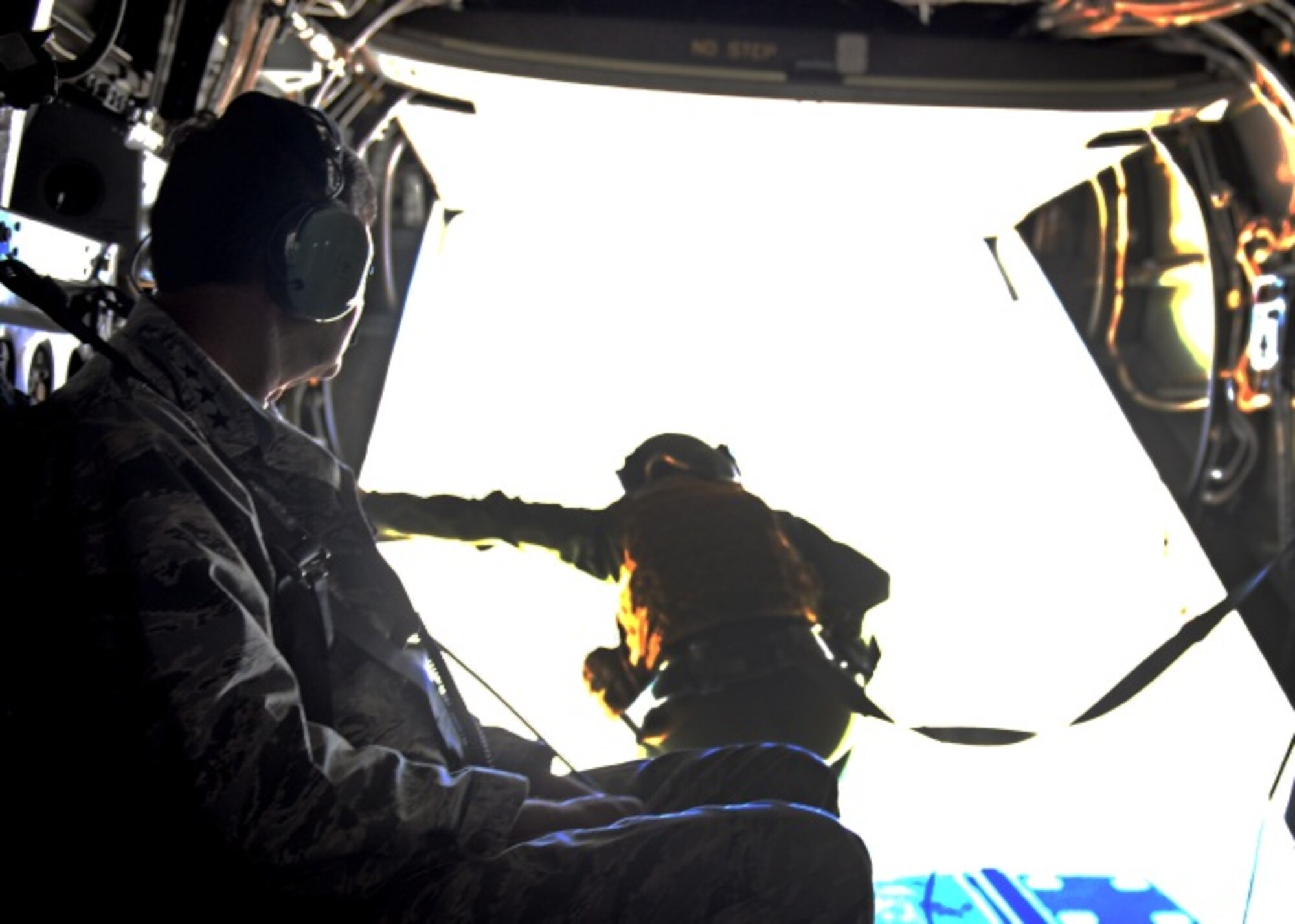U.S. Air Force Lt. Gen. Brad Heithold, Air Force Special Operations Command commander, looks out the back of a CV-22 Osprey after visiting 27th Special Operations Wing flightline operations Sept. 3, 2014. During his flight, Heithold received a bird’s eye view of Melrose Air Force Range, N.M., and a synopsis of flying and maintenance operations. (U.S. Air Force photo/Airman 1st Class Shelby Kay-Fantozzi)