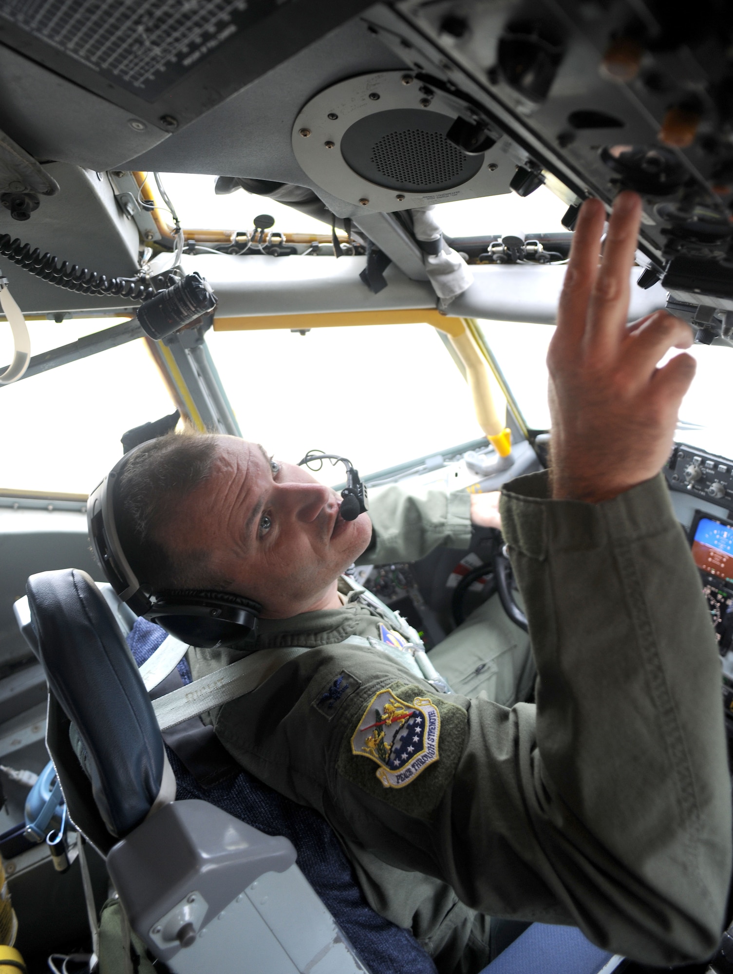 U.S. Air Force Col. Kenneth T. Bibb, Jr., 100th Air Refueling Wing commander and KC-135 Stratotanker pilot, performs a preflight inspection before a flight to Moron Air Base, Spain, Aug. 26, 2014, on RAF Mildenhall, England. Bibb is qualified as a command pilot with more than 4,500 flight hours and tries to fly whenever his schedule as a wing commander allows. (U.S. Air Force photo/Senior Airman Kate Maurer/Released)