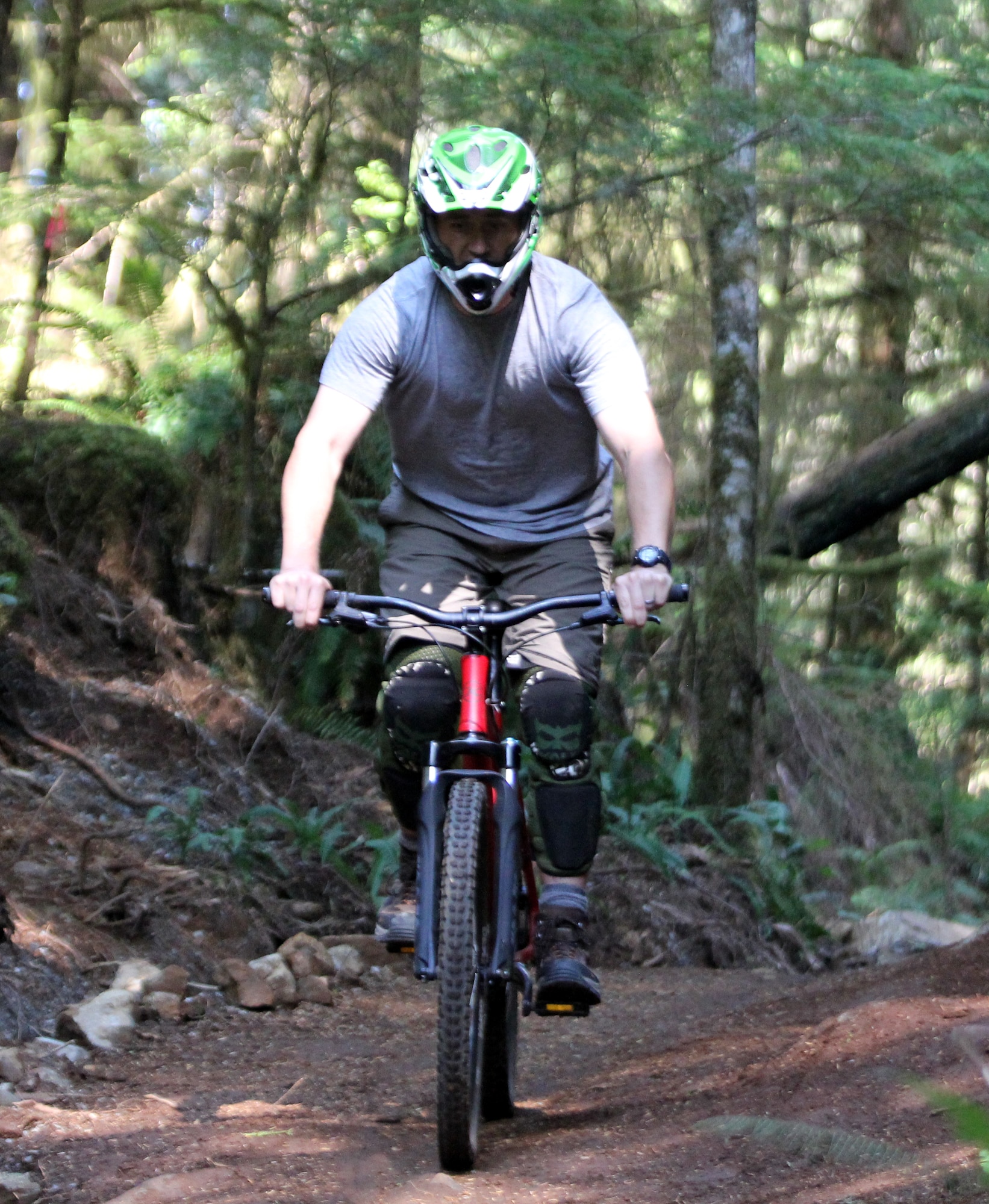Master Sgt. David Follmuth, 8th Airlift Squadron first sergeant, enjoys navigating a mountain bike trail, August 21, 2014, at the Malibu Club, located in the Princess Louisa inlet, 100 miles north of Vancouver, Canada. More than 260 JBLM military and family members were afforded this program that offered them the time to get away from the stresses of everyday life, spend quality time together, laugh a lot and to be restored. (U.S. Air Force photo/Master Sgt. Todd Wivell)