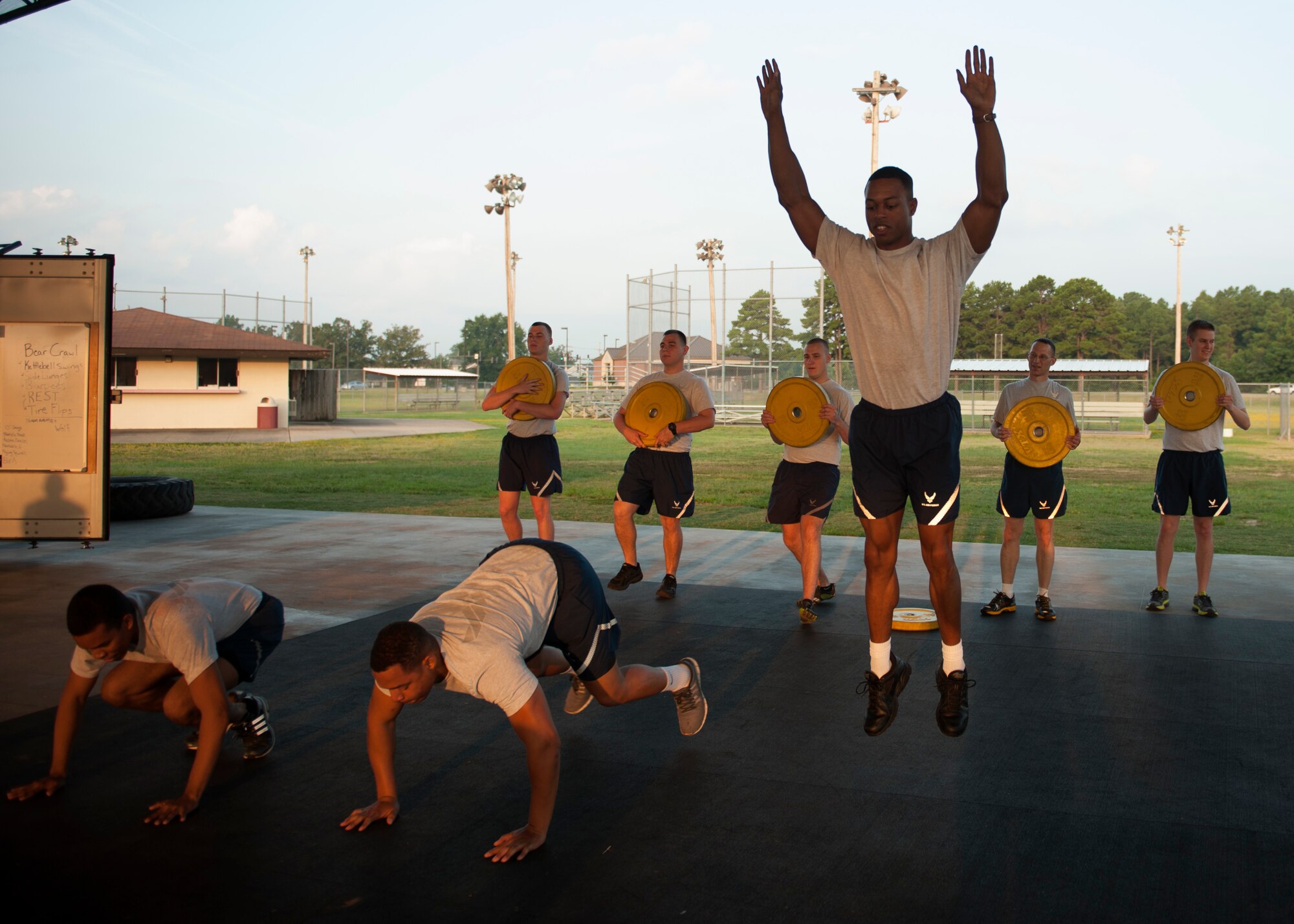 Airmen from the 19th Communications Squadron participate in squadron physical training Aug. 27, 2014, at Little Rock Air Force Base, Ark. The physical domain of Comprehensive Airmen Fitness encourages Airmen to strengthen their resilience through focusing on fitness, endurance, nutrition or even sleep habits. (U.S. Air Force photo by Airman 1st Class Scott Poe)
