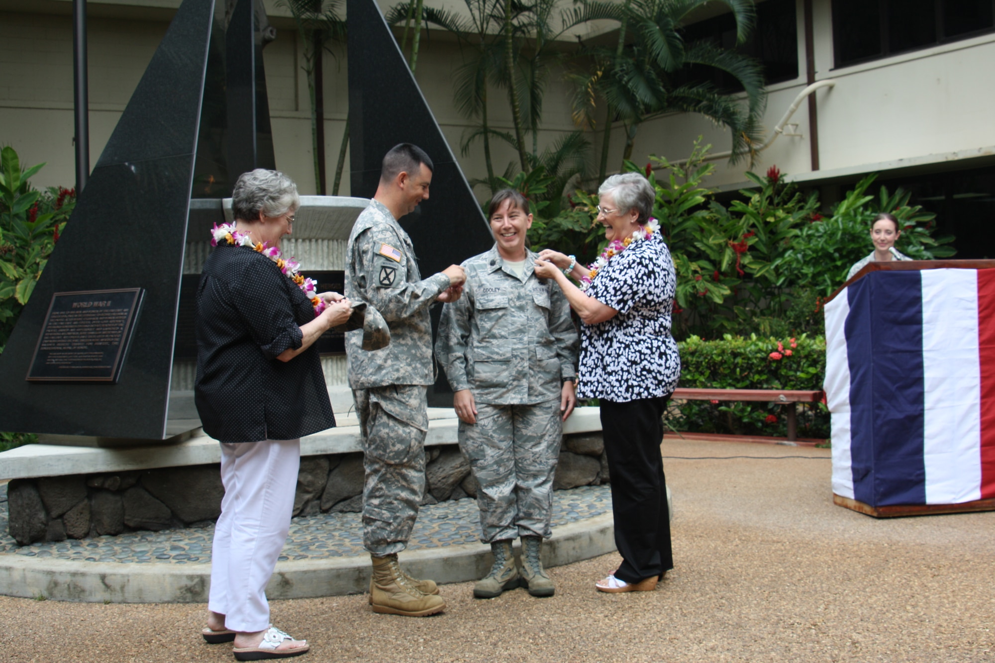 Lt. Col. Heather Cooley, 19th Maintenance Squadron commander, smiles as her mother participates in her promotion ceremony to lieutenant colonel by pinning on her rank. Also in attendance was Cooley’s husband, Maj. Myles Tenbroeck, currently serving in the Arkansas National Guard and her aunt, a retired lieutenant colonel. (Courtesy photo)