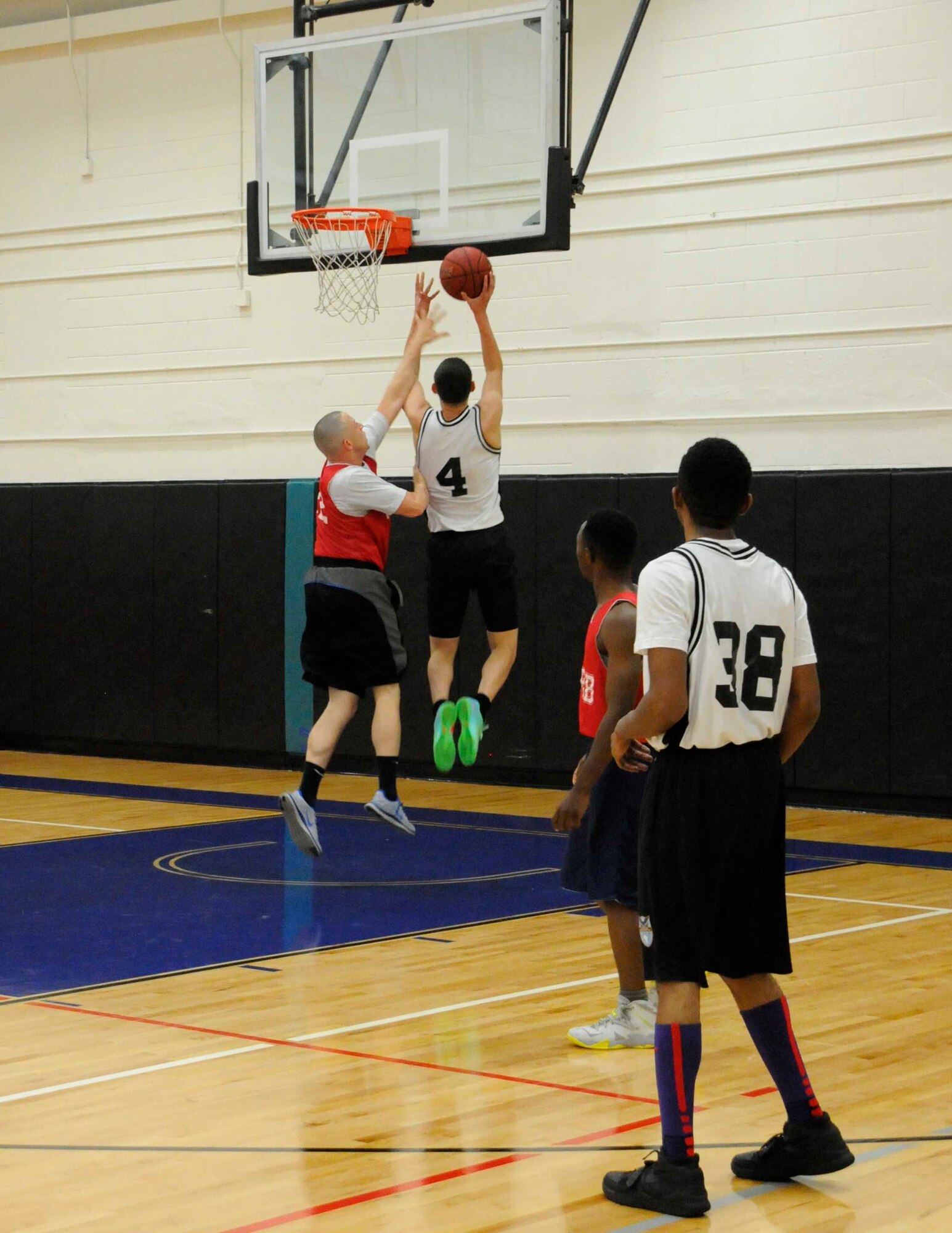 A player at Homestead Air Reserve Base, Fla., goes for a shot during a completive game of basketball on 14 Aug. The players compete against other Homestead ARB teams as a part of the intramural sports program. (U.S. Air Force photo/Senior Airman Aja Heiden)