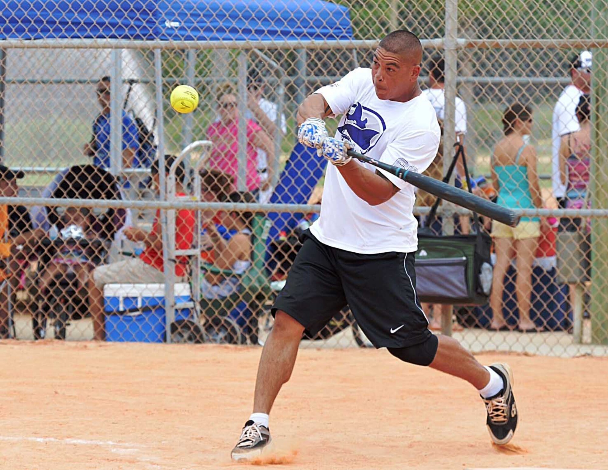 Homestead Makos team member swings at ball at the Military World Softball Tournament in Panama City Beach, Fla. The Makos competed against over 100 other teams at the tournament. (Courtesy photo)