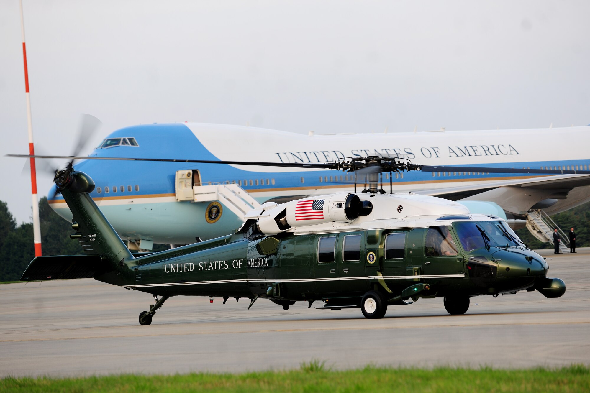 Marine One taxis past Air Force One in preparation for its departure from RAF Fairford, United Kingdom, Sept. 3, 2014. The helicopter transported President Barack Obama from Fairford to Wales, the location of the 2014 NATO Summit. (U.S. Air Force photo by Staff Sgt. Jarad A. Denton/Released)