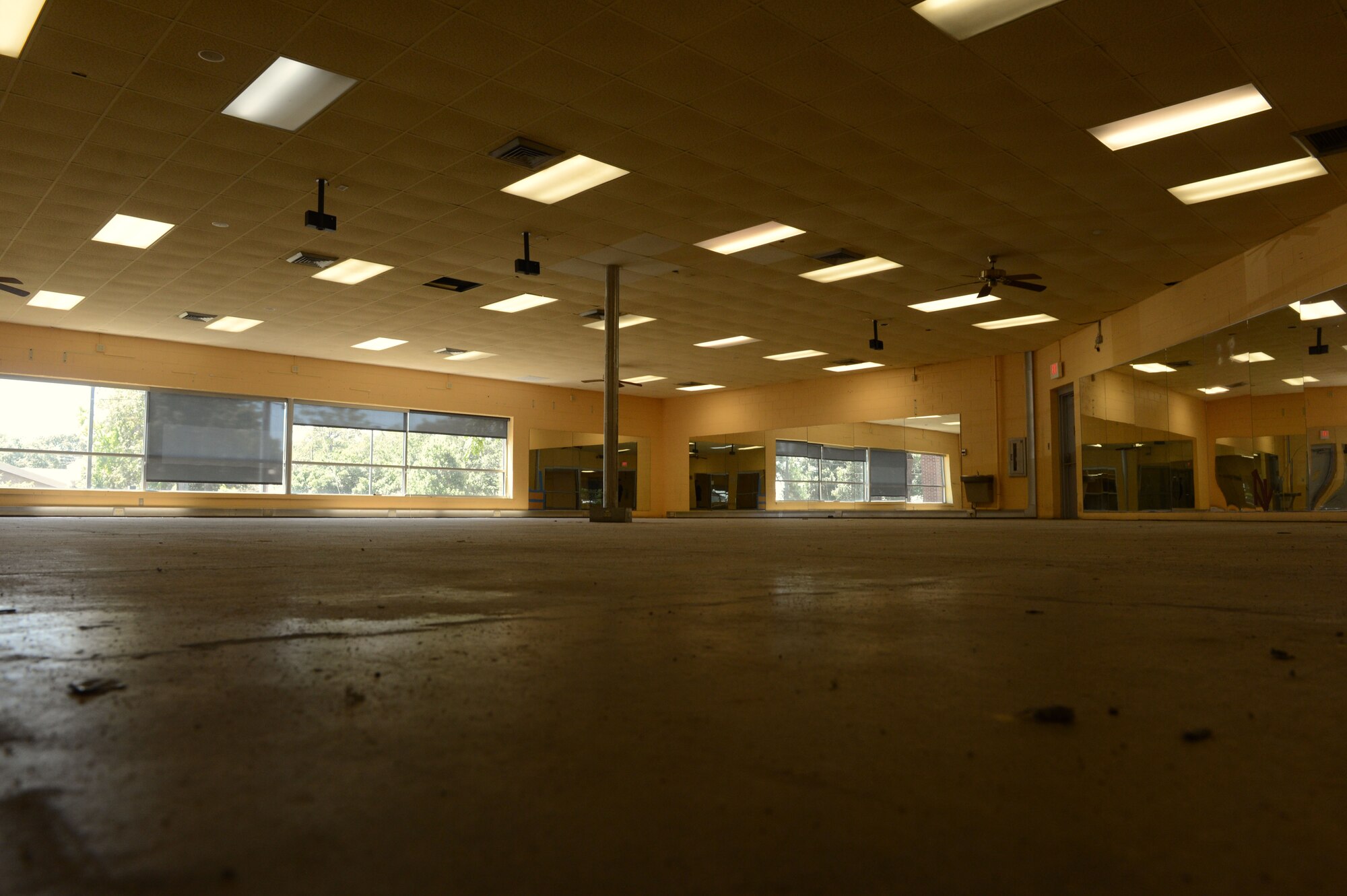 The aerobics room inside the original 20th Force Support Squadron Fitness and Sports Center is vacant due to upcoming renovations at Shaw Air Force Base, S.C., Aug. 28, 2014. The room, along with both basketball courts will have wood floors added, which will better absorb the impact of a jump while working out. (U.S. Air Force photo by Airman 1st Class Jensen Stidham/Released) 