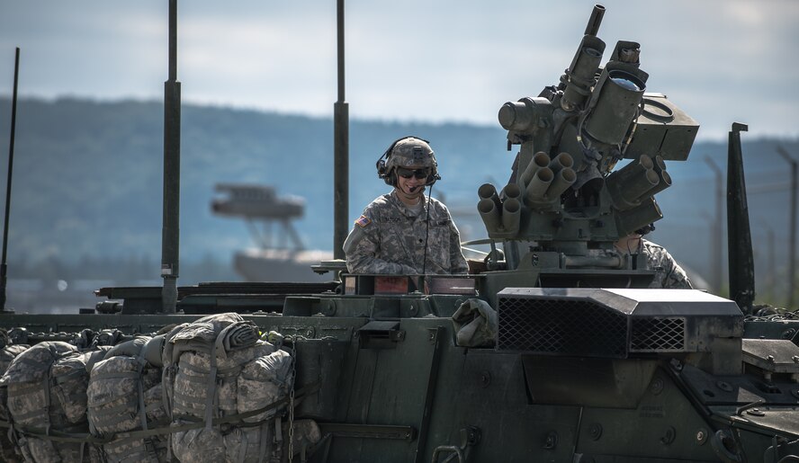 U.S. Army Stryker infantry carrier vehicles convoy across the flightline during operations in support of Steadfast Javelin II on Ramstein Air Base, Germany, Sept. 3, 2014. This NATO exercise involves over 2,000 troops from nine nations, and takes place across Estonia, Germany, Latvia, Lithuania and Poland. The exercise focuses on increasing interoperability and synchronizing complex operations between allied air and ground forces through airborne and air assault missions. (U.S. Air Force photo/Airman 1st Class Jordan Castelan)