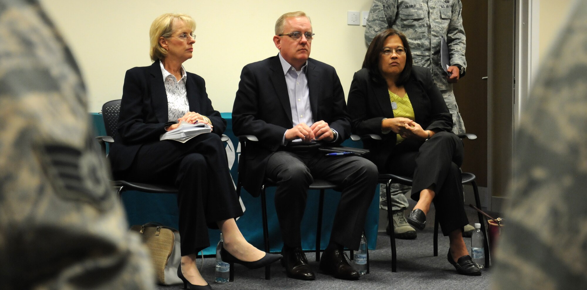 From left, Jeanette James, subcommittee on military personnel majority lead; Dave Giachetti, subcommittee on military personnel, and Debra Wada, subcommittee on military personnel minority lead, meet with victim advocates during a visit to the sexual assault prevention and response center Aug. 19, 2014, on RAF Mildenhall, England. The members of Congress asked what more could be done to help victims of sexual assault and discussed the reporting methods and how the differences affect service members. (U.S. Air Force photo/Gina Randall/Released)