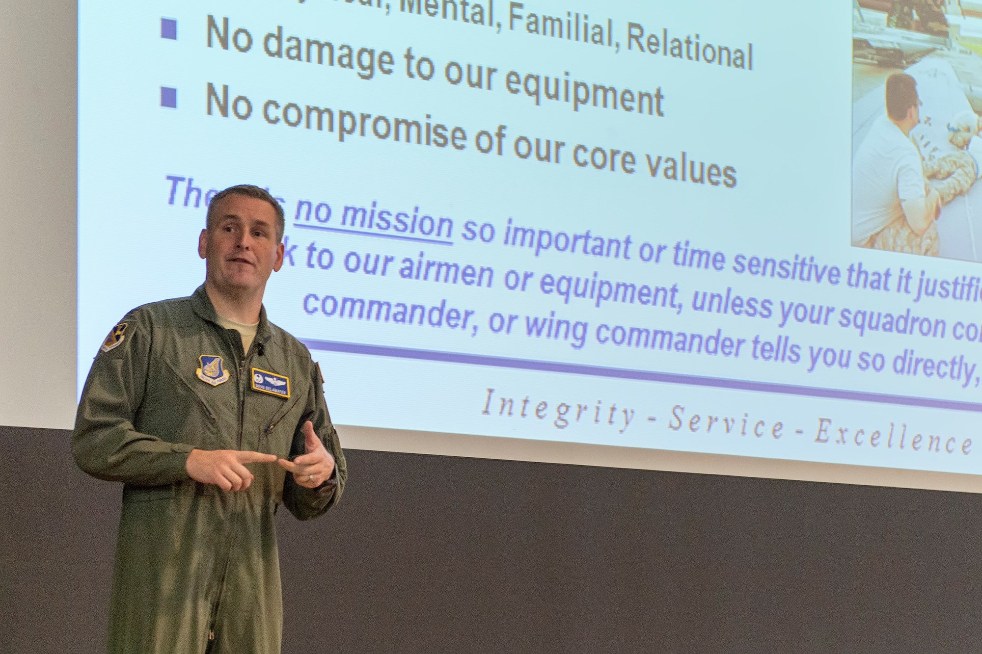 Col. Douglas DeLaMater, 374th Airlift Wing commander, addresses concerns during an all call at Yokota Air Base, Japan, Aug. 31, 2014. (U.S. Air Force photo by Osakabe Yasou/Released) 