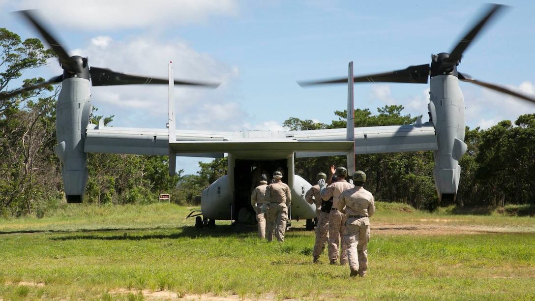 Marines load into the MV-22B Osprey to prepare to fast rope during the Helicopter Rope Suspension Techniques course Aug. 20 at the Central Training Area. The students finalized their practical applications portion by performing rappels out of the aircraft. The Marines are with various units across III Marine Expeditionary Force. The Osprey is with Marine Medium Tiltrotor Squadron 265, Marine Aircraft Group 36, 1st Marine Aircraft Wing, III MEF. 