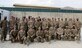 Members of the 439th Air Expeditionary Advisory Squadron security forces pose for a photo just after receiving Air Force Combat Action Medals during a ceremony  Sept. 2, 2014, at Forward Operating Base Oqab, Kabul, Afghanistan. The Airmen were recognized for actions defending FOB Oqab,  Afghan air force’s Kabul Air Wing and a NATO base, all located on Kabul International Airport, from a complex attack July 17, 2014. (U.S. Air Force photo/Senior Master Sgt. Mike Hammond)