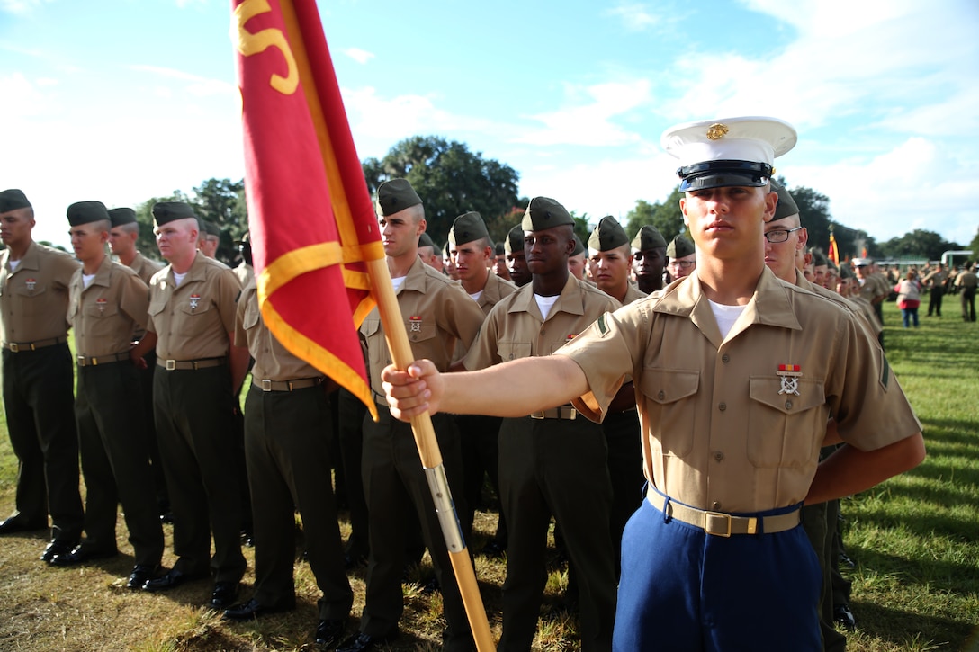 Pfc. Spencer J. Williams, honor graduate of platoon 2065, awaits graduation at Marine Corps Recruit Depot Parris Island, S.C., Sept. 5, 2014. Williams, a Columbia, S.C. native, was recruited from Marine Corps Recruiting Sub Station Columbia, Recruiting Station Columbia. Recruit training signifies the transformation of a civilian to a United States Marine. Upon graduation, the newly-minted Marines will receive ten days of leave before attending the School of Infantry East, Camp Geiger, N.C. The Marines will be trained in basic infantry skills to ensure Marines are combat-ready. (U.S. Marine Corps Photo by Cpl. Stanley Cao)