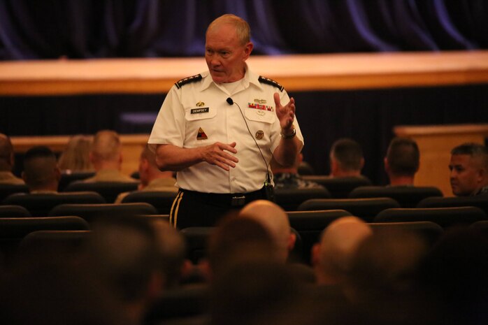 Chairman of the Joint Chiefs of Staff Gen. Martin Dempsey answers a question during a town hall meeting with Marines, sailors and former service members aboard Naval Station Great Lakes, Ill., Sept. 5. Dempsey discussed a wide range of topics including involvement in the Middle East, and how budget cuts affect service members worldwide. 