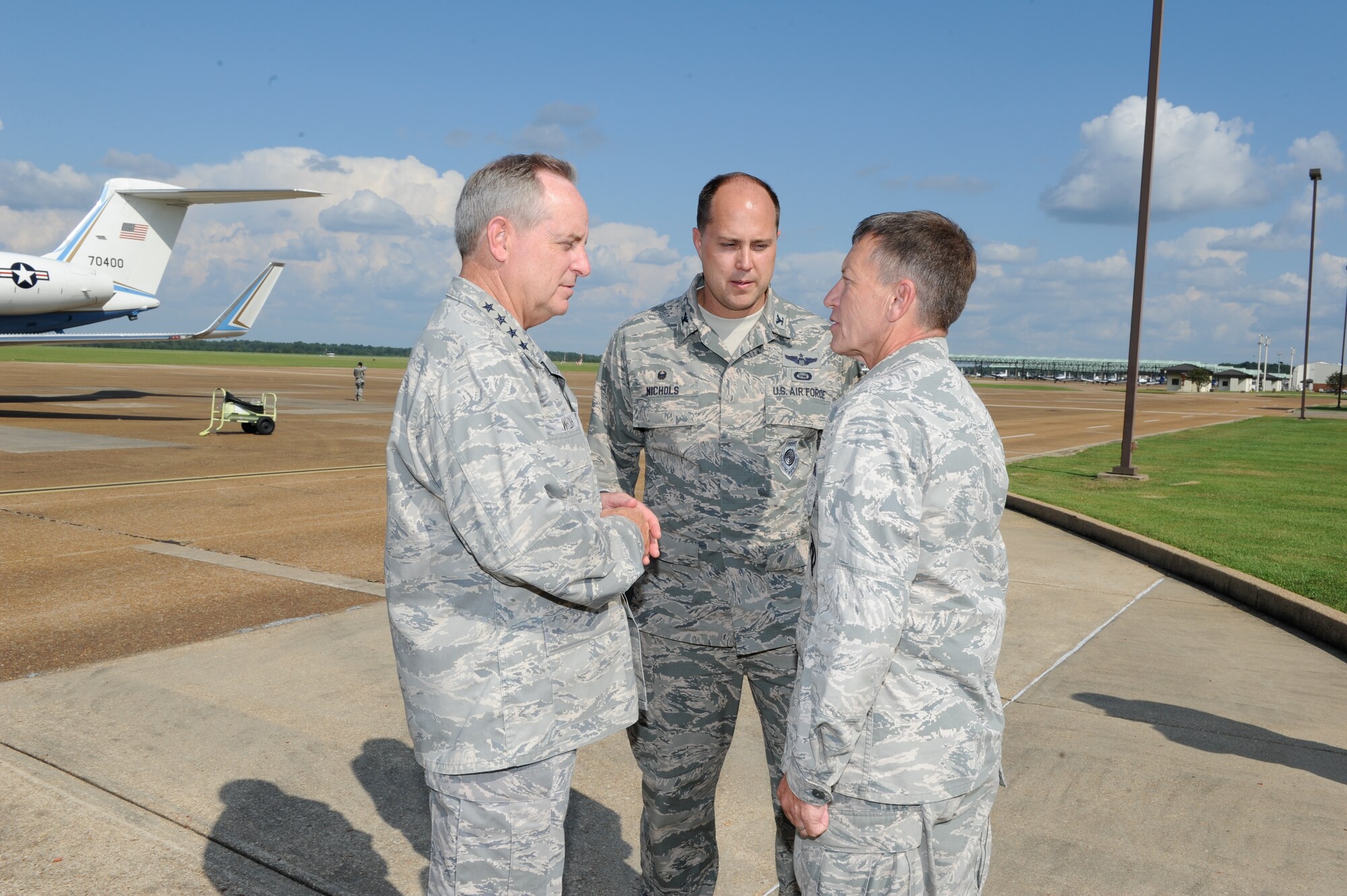 Lt. Col. Doug Jantzen, 14th Flying Training Wing Maintenance
Authority, is congratulated Sept. 5 by Gen Mark A. Welsh III, Chief of Staff
of the Air Force and Col. John J. Nichols, 14th Flying Training Wing
commander, for 40 years of service in the United States Air Force.
Jantzen, the longest tenured lieutenant colonel in the Air Force, is
retiring June 1, 2015, with 40 years, 8 months and 20 days of continuous
active duty service. Jantzen was one of four Airmen coined prior to Welsh's
departure from Columbus AFB, Miss. (U.S. Air Force Photo/Elizabeth Owens)