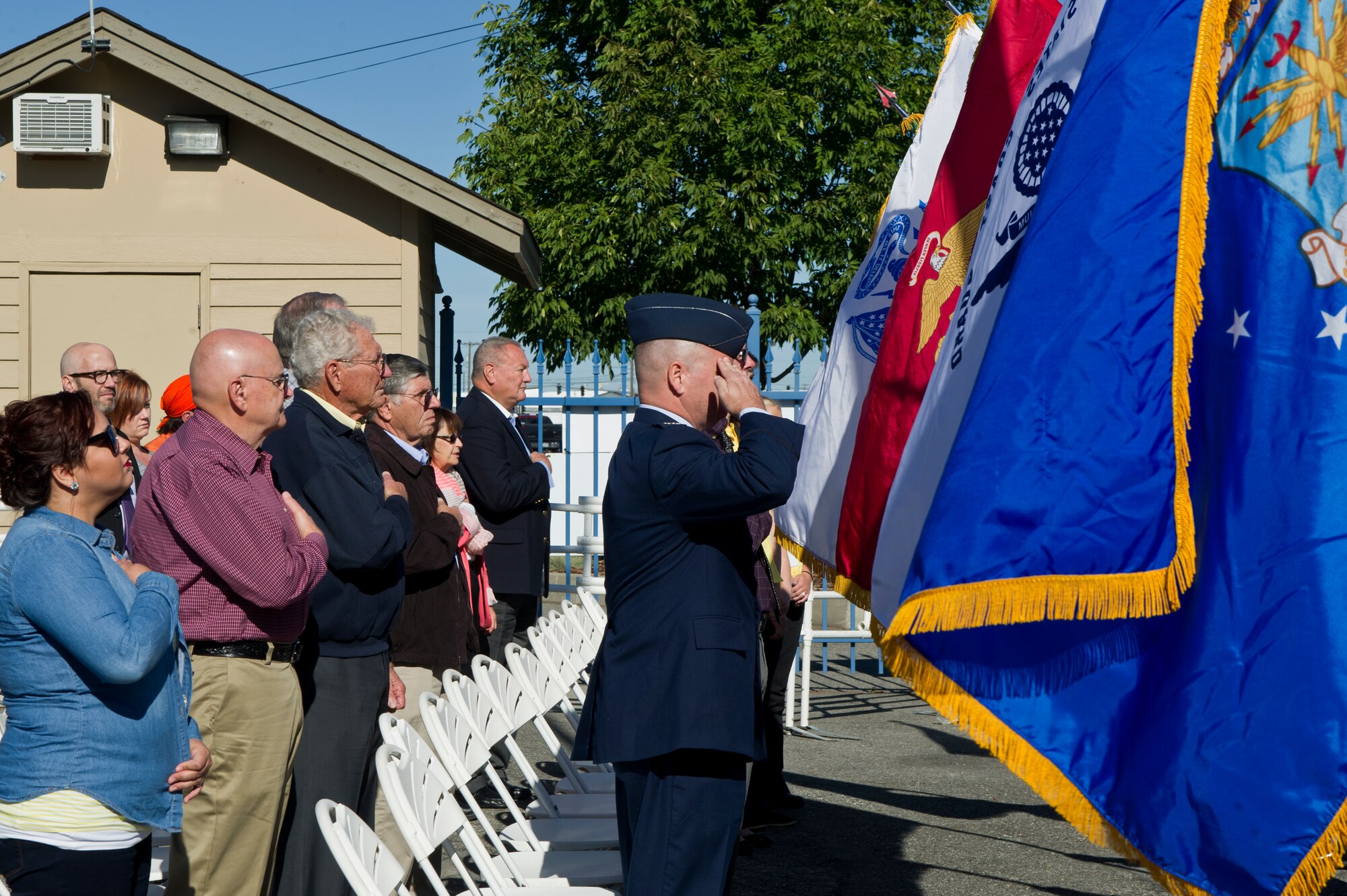 Representative from each military branch Honor Guard presents the colors at the Spokane Interstate Fair opening ceremony in Spokane, Washington, Sept. 5, 2014. Spokane County's Interstate Fair is a 10-day event beginning the Friday after Labor Day each year. The Fair is held at the Spokane County Fair and Expo Center on the corner of Broadway and Havana, its location since 1952. (U.S. Air Force photo by Staff Sgt. Alexandre Montes/Released)
