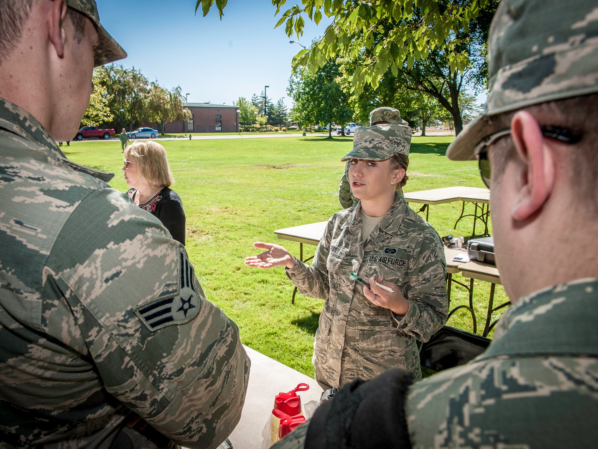 Airman 1st Class Erinn Gray, 92nd Air Refueling Wing civil law paralegal, educates Airmen about the legal ramifications resulting from a DUI during the DUI Fair at Fairchild Air Force Base, Washington, Sept. 5, 2014. DUIs are a concern across the Air Force and the statistics show it doesn’t seem to be getting better. Events like these allow Airmen to experience a simulated drunken state safely and under the guidance of security forces and Team Fairchild’s locally run Air Force Drug and Alcohol Abuse Program. (U.S. Air Force photo by Staff Sgt. Benjamin W. Stratton/Released)
