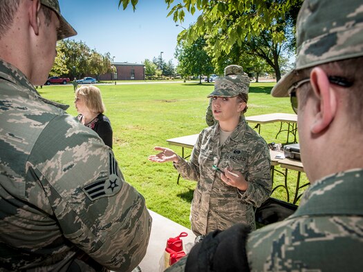 Airman 1st Class Erinn Gray, 92nd Air Refueling Wing civil law paralegal, educates Airmen about the legal ramifications resulting from a DUI during the DUI Fair at Fairchild Air Force Base, Washington, Sept. 5, 2014. DUIs are a concern across the Air Force and the statistics show it doesn’t seem to be getting better. Events like these allow Airmen to experience a simulated drunken state safely and under the guidance of security forces and Team Fairchild’s locally run Air Force Drug and Alcohol Abuse Program. (U.S. Air Force photo by Staff Sgt. Benjamin W. Stratton/Released)