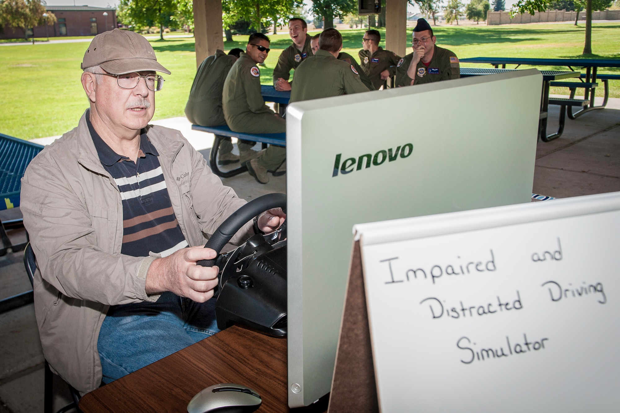Jay Logan, 92nd Civil Engineer Squadron engineer, takes control of the impaired and distracted driving simulator during the DUI Fair at Fairchild Air Force Base, Washington, Sept. 5, 2014. DUIs are a concern across the Air Force and the statistics show  the issue doesn’t seem to be getting better. Events like these allow Airmen to experience a simulated drunken state safely and under the guidance of security forces and Team Fairchild’s locally run Air Force Drug and Alcohol Abuse Program. (U.S. Air Force photo by Staff Sgt. Benjamin W. Stratton/Released)
