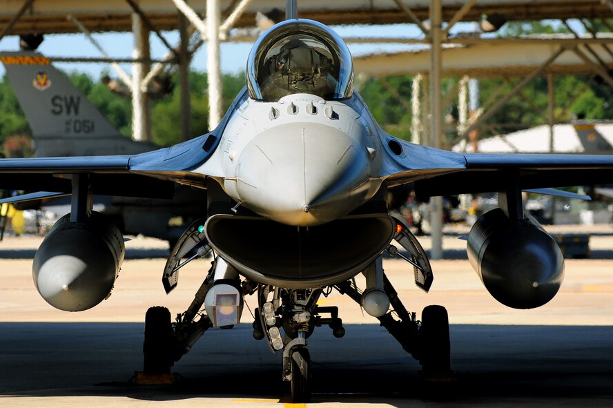 Royal Air Force Flight Lieutenant Benjamin Cable, 79th Fighter Squadron assistant director of operations, prepares for takeoff in his F-16CM Fighting Falcon, Aug. 27, 2014 at Shaw Air Force Base, S.C. Cable is part of the Royal Air Force Exchange Officer program and is a trained weapons officer. (U.S. Air Force photo by Staff Sgt. Kenny Holston/Released)