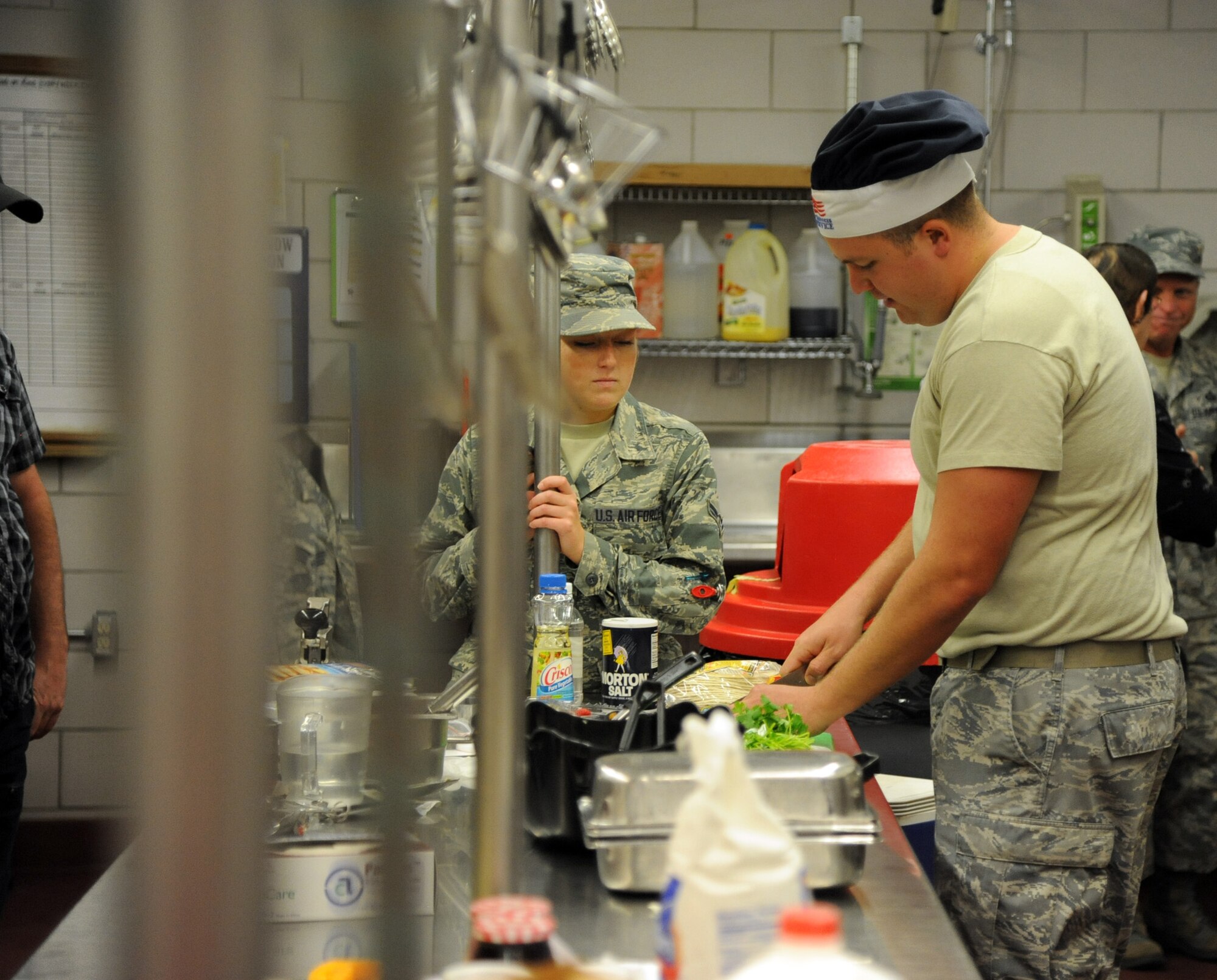 Staff Sgt. Sean Birdwell, 120th Airlift Wing chef, prepares raspberry chicken tacos during the Warrior Chef competition Sept. 4 at the Elkhorn Dining Facility. Competitors were judged on their dish’s taste, appearance, creativity, dress and appearance of the chef team and honoring the theme ingredient. (U.S. Air Force photo/Airman 1st Class Joshua Smoot)