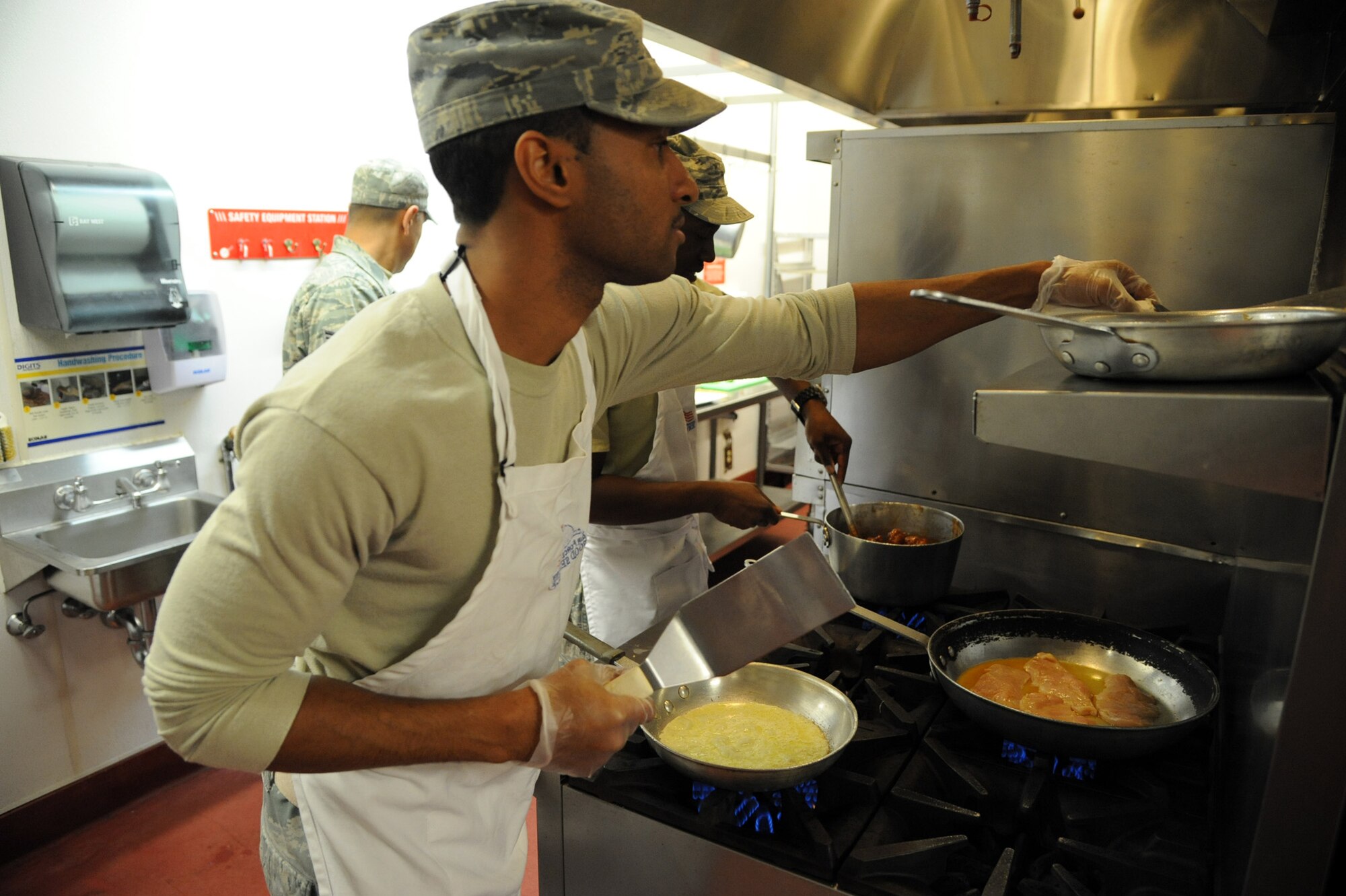Staff Sgt. Justin Reynolds, 341st Force Support Squadron bravo flight chef, cooks raspberry crepes during the Warrior Chef competition Sept. 4 at the Elkhorn Dining Facility. The objective of the 341st Missile Wing Warrior Chef competition is to recognize and reward chefs for their performance, while enhancing their proficiency. (U.S. Air Force photo/Airman 1st Class Joshua Smoot)