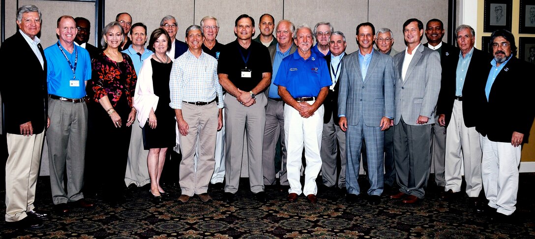 Former Columbus Air Force Base wing commanders and Columbus Wingmen pose for a photo after their reunion luncheon Sept. 4 at the Columbus Club. The title of Wingman is awarded to a member of the community who has made exceptional contributions to Columbus AFB and provides community support to the wing. (U.S. Air Force Photo/Sharon Ybarra)