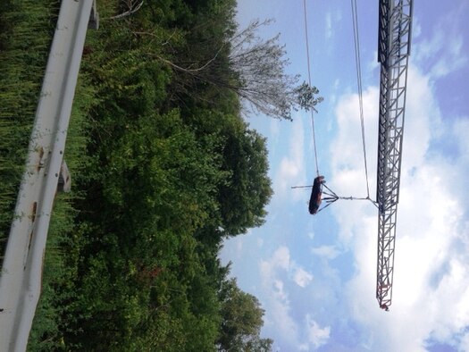 Wright-Patterson Air Force Base personnel were called on to perform a rope rescue, including a rescue basket, Aug. 25 in Riverside when an Air Force Reservist’s truck rolled over in a ravine. (Contributed photo)