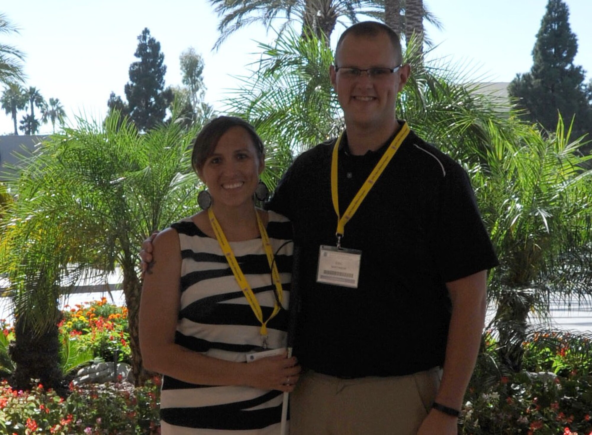 Senior Airman Eric Martinson and his wife, Leah, take a break from Air Force Reserve Yellow Ribbon Program training Aug. 23, 2014, in Costa Mesa, Calif. Their preparations for his upcoming first deployment include making necessary arrangements to ensure that Leah Martinson, who is blind, is ready to run their household without him. (U.S. Air Force photo by Master Sgt. Luke Johnson)