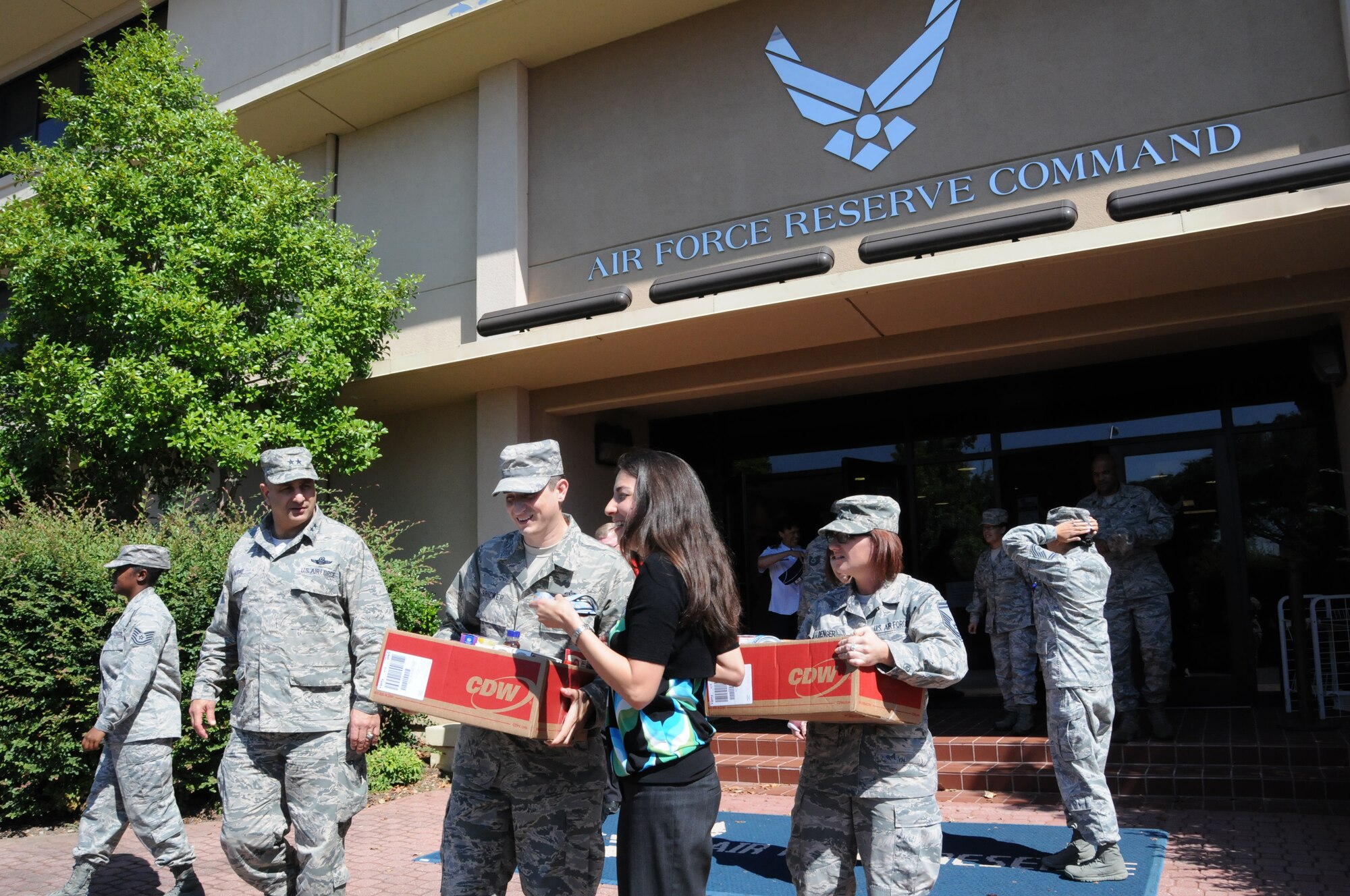 Maj. Gen. Richard Haddad (second from left), Air Force Reserve Command vice commander, joins AFRC volunteers to congratulate them on their accomplishments as they gather final donations for AFRC's inaugural participation as a lead agency in the Feds Feed Families campaign. 

“Thank you to all of the volunteers and the people who supported these efforts in the command,” said Maj. Gen. Richard Haddad, AFRC vice commander. “We applaud your efforts.”

Volunteers (left to right) Tech. Sgt. Demetria Williams, Tech. Sgt. Daniel Bricker, Rachel Cox and Senior Master Sgt. Kelly Denger help make the final transport of donated, non-perishable food items for pickup Aug. 28, 2014. The command collected more than 1,425 pounds of food to help feed people in need in our local community. (U.S. Air Force photo/ Master Sgt. Shanda L. De Anda)
