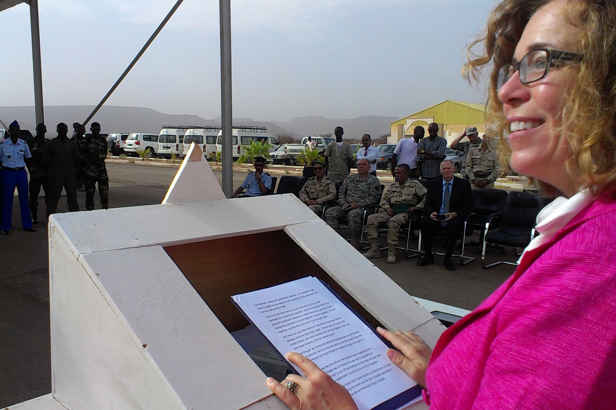 Martha Patterson, Charge d’Affaires, U.S. Embassy in Mauritania, congratulates African Partnership Flight Mauritania students Sept. 4, 2014, at Atar Airbase in Mauritania, during their graduation from a week-long multi-national partnership event. Six nations participated in this training.  The graduation ceremony marked the end of the fourth U.S. co-hosted APF event. (U.S. Air Force photo/Master Sgt. Brian Boisvert/Released)