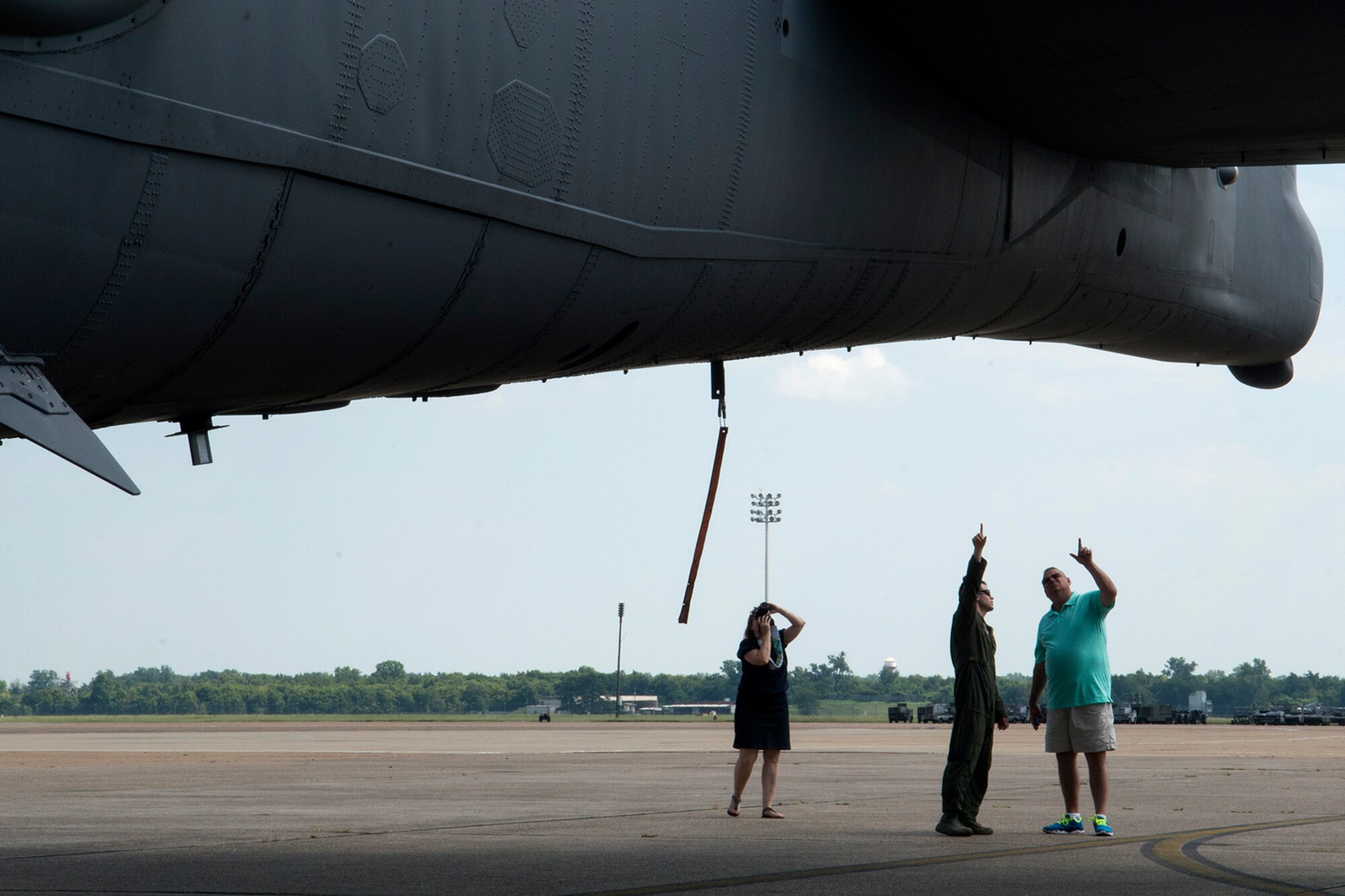 A student of the Formal Training Unit (FTU) class 14-01 gives his family a tour of a 307th Bomb Wing B-52H Stratofortress on Aug. 28, 2014, Barksdale Air Force Base, La. The FTU is comprised of the 93rd and 11th Bomb Squadrons and trains all active duty and reserve aircrew to fly the B-52. (U.S. Air Force photo by Master Sgt. Greg Steele/Released)
