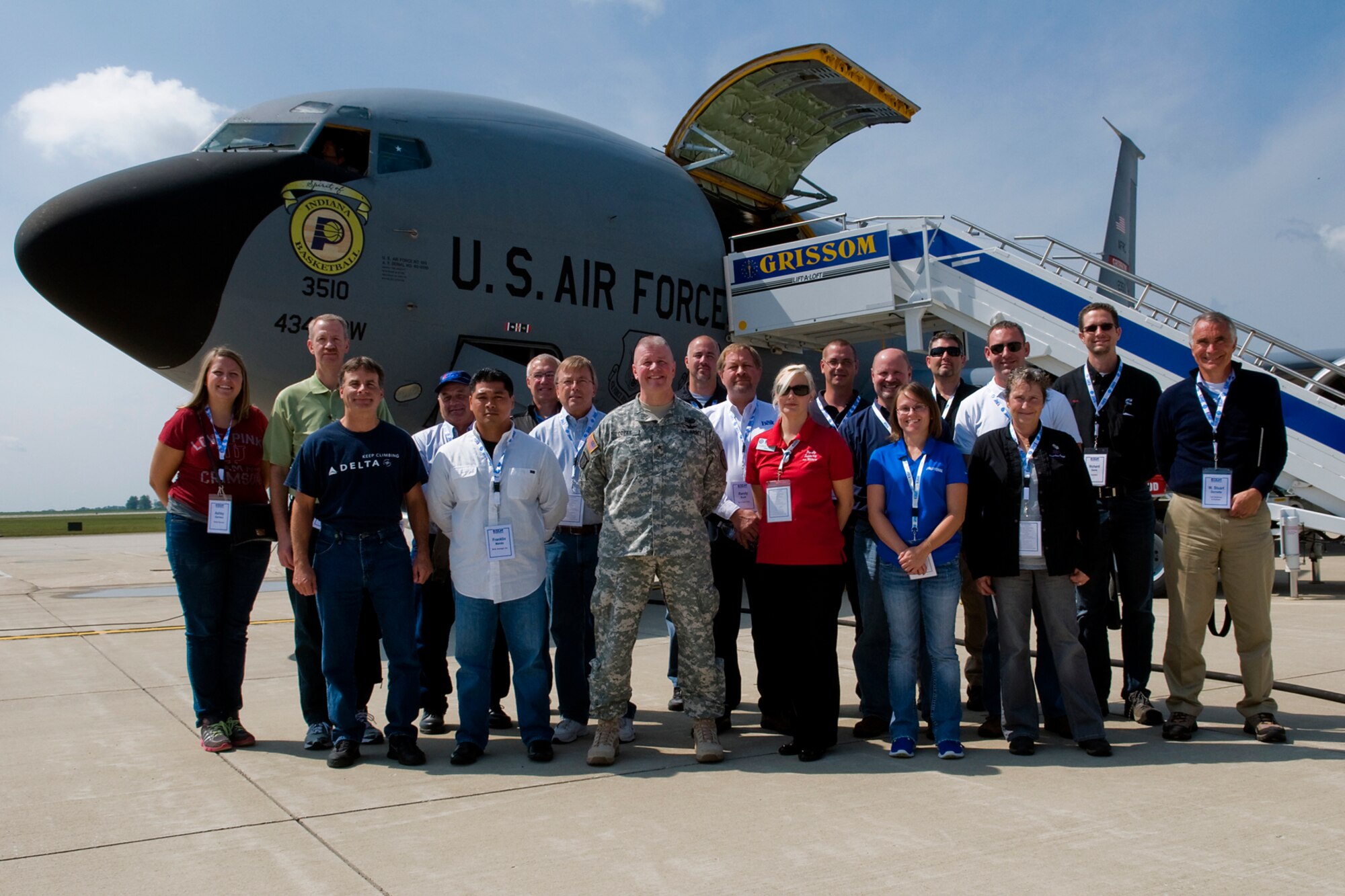 A group of employers pose for a photo in front of a KC-135R Stratotanker aircraft from the Air Force Reserve's 434th Air Refueling Wing at Grissom Air Reserve Base, Ind., before taking off on a refueling mission Aug. 20, 2014. Indiana's two flying wings partnered together to fly 37 employers of guardsmen and reservists on a boss lift aimed at educating them about their employees' military service and responsibilities. (U.S. Air Force photo/Staff Sgt. Andrew McLaughlin) 
