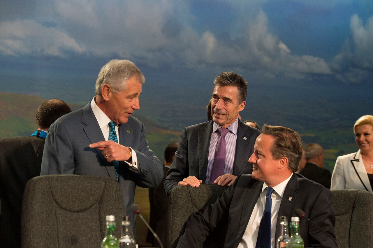 Defense Secretary Chuck Hagel, NATO Secretary General Anders Fogh Rasmussen and British Prime Minister David Cameron talk together Sept. 5, 2014, during a meeting on the final day of the NATO Summit in Wales. NATO photo