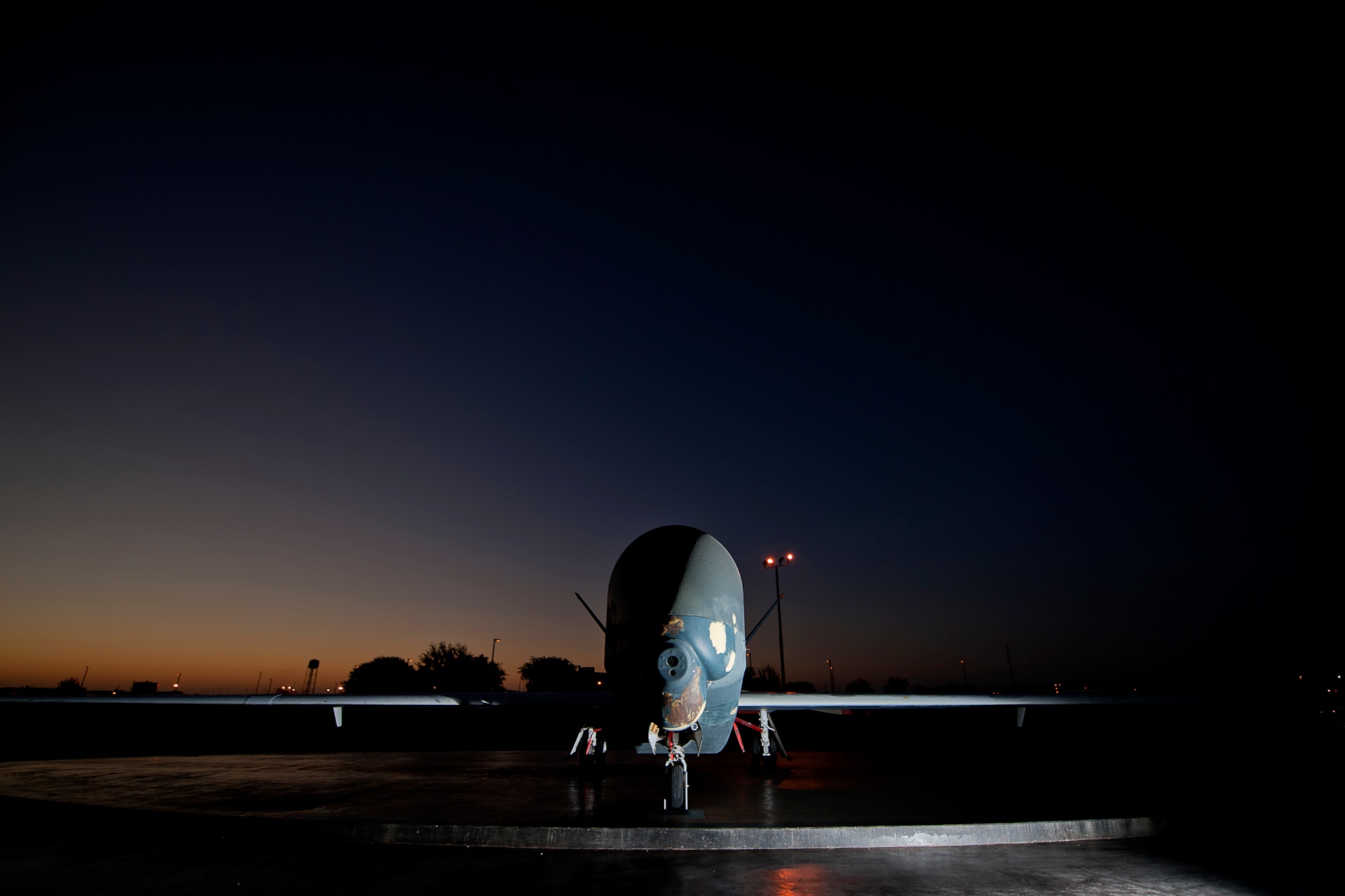 GOODFELLOW AIR FORCE BASE, Texas – A decommissioned RQ-4 Global Hawk sits on display at the corner of Kearney Boulevard and West Canberra Street Sept. 2. During its time in the Air Force, this Global Hawk logged 4,830 hours in 285 missions, including a deployment to the 380th Air Expeditionary Wing, Southwest Asia, in support of Operation Enduring Freedom. (U.S. Air Force photo/ Airman 1st Class Devin Boyer)