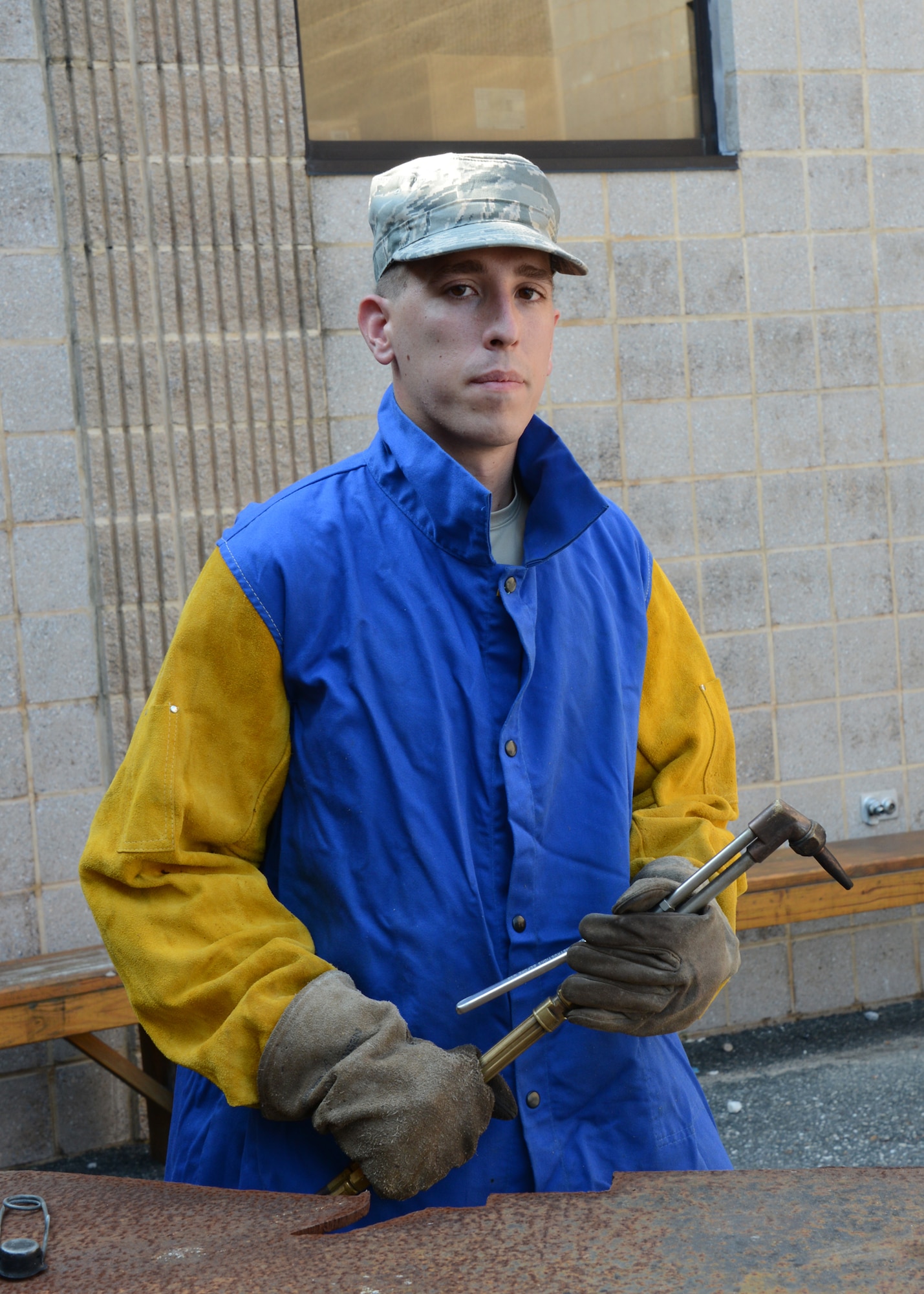 Senior Airman Andrew Bracken, structural journeyman assigned to the 175th Civil Engineering Squadron, Warfield Air National Guard Base, Baltimore, Md., prepares an acetylene torch before demonstrating how to raw cut steel for fabrication, September 6, 2014. In addition to serving with the Maryland Air National Guard Bracken also volunteers his time with the Dallastown Volunteer Fire Department. (Air National Guard photo by Tech. Sgt. Christopher Schepers/RELEASED)