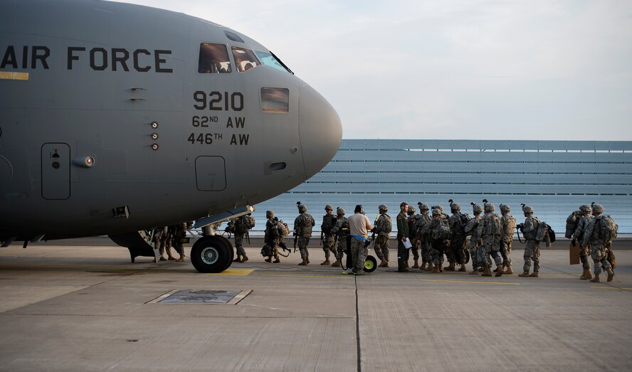 Soldiers assigned to Apache Troop, 1st Squadron, 2nd Cavalry Regiment load into a C-17 Globemaster III in support of Steadfast Javelin II on Ramstein Air Base, Germany, Sept. 5, 2014. Steadfast Javelin II is a NATO exercise involving over 2,000 troops and takes place across Estonia, Germany, Latvia, Lithuania and Poland. The exercise focuses on increasing interoperability and synchronizing complex operations between allied air and ground forces through airborne and air assault missions. (U.S. Air Force photo/Senior Airman Damon Kasberg)