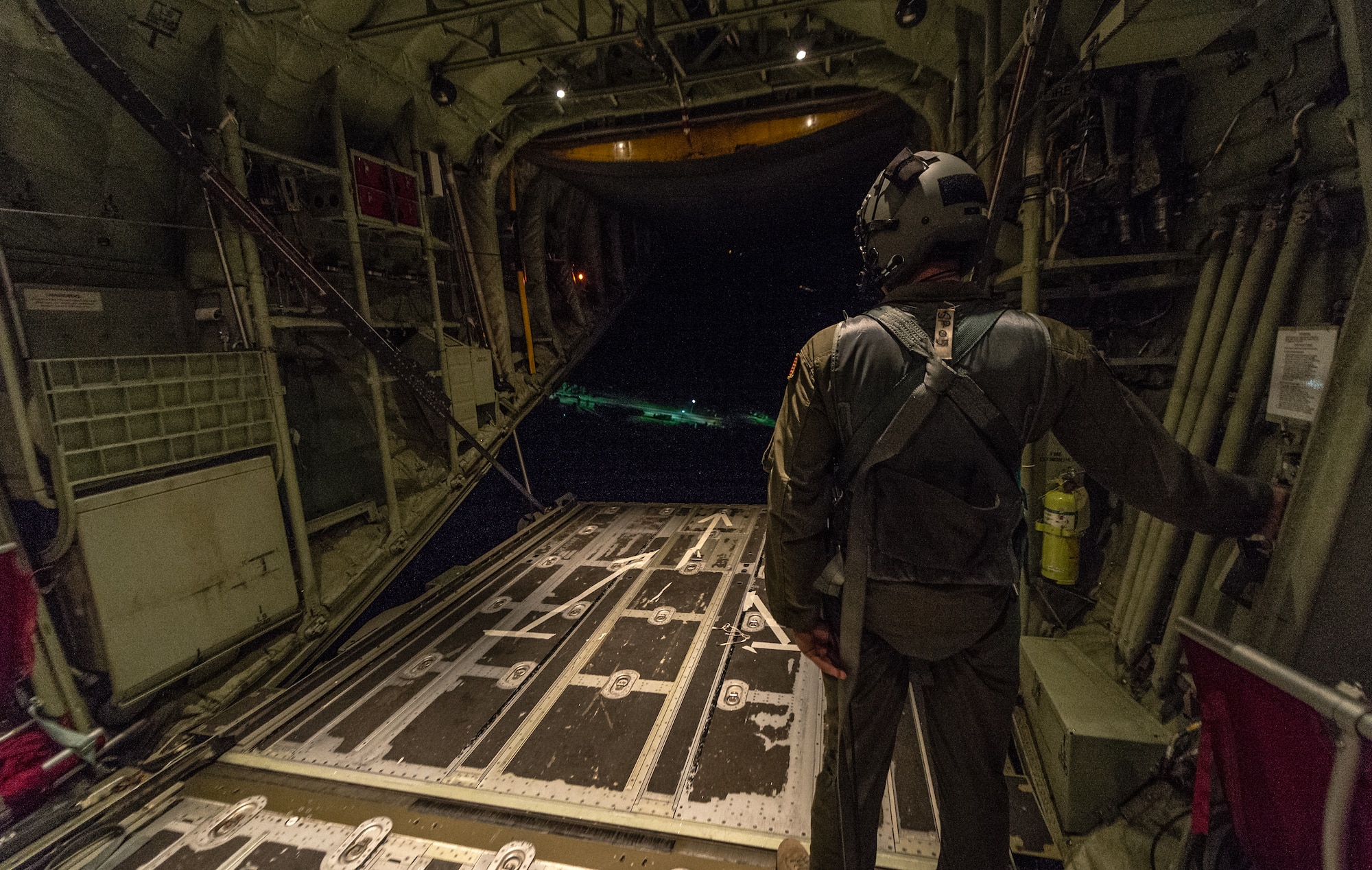 U.S. Air Force Senior Airman Christian McDevitt, 37th Airlift Squadron loadmaster raises the ramp door of a 37th AS C-130J Super Hercules after 36 paratroopers from 1st Battalion, 503rd Infantry Regiment, 173rd Airborne Brigade exited the aircraft during exercise Steadfast Javelin II over Lithuania, Sept. 5, 2014. The exercise prepares U.S., NATO Allies and European security partners to conduct unified land operations through the simultaneous combination of offensive, defensive, and stability operations appropriate to the mission and the environment, and to sustain interoperability with partner nations. (U.S. Air Force photo/Airman 1st Class Jordan Castelan)
