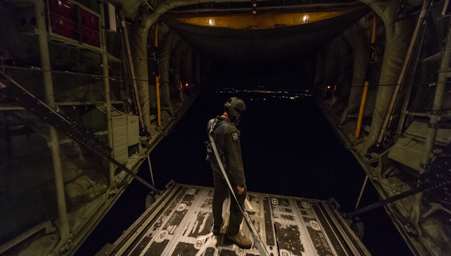 U.S. Air Force Senior Airman Christian McDevitt, 37th Airlift Squadron loadmaster checks to see if there are no obstruction between the ramp and door of a 37th AS C-130J Super Hercules during exercise Steadfast Javelin II over Lithuania, Sept. 5, 2014. The exercise prepares U.S., NATO Allies and European security partners to conduct unified land operations through the simultaneous combination of offensive, defensive, and stability operations appropriate to the mission and the environment, and to sustain interoperability with partner nations. (U.S. Air Force photo/Airman 1st Class Jordan Castelan)