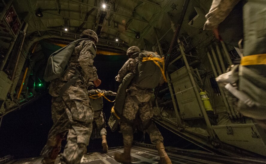 U.S. Army paratroopers with the 1st Battalion, 503rd Infantry Regiment, 173rd Airborne Brigade, exit a 37th Airlift Squadron C-130J Super Hercules during an airdrop as part of exercise Steadfast Javelin II over Lithuania, Sept. 5, 2014, The exercise sustains interoperability between NATO Allies and Partnership for Peace partner nation forces.  The interoperability has been gained during combat and multinational contingency operations over the past seven decades, while focusing on building capacity for the current and future operational environment. (U.S. Air Force photo/Airman 1st Class Jordan Castelan)