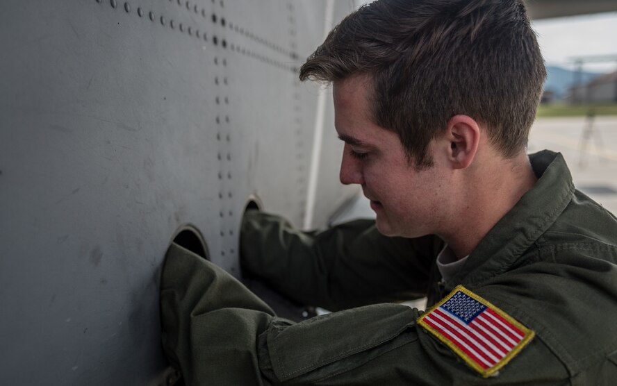 U.S. Air Force Senior Airman Christian McDevitt, 37th Airlift Squadron loadmaster, runs through his preflight checks on a 37th AS C-130J Super Hercules before airlifting paratroopers with the 1st Battalion, 503rd Infantry Regiment, 173rd Airborne Brigade during exercise Steadfast Javelin II on Ramstein Air Base, Germany, Sept. 5, 2014. The exercise prepares U.S., NATO Allies and European security partners to conduct unified land operations through the simultaneous combination of offensive, defensive, and stability operations appropriate to the mission and the environment, and to sustain interoperability with partner nations. (U.S. Air Force photo/Airman 1st Class Jordan Castelan)